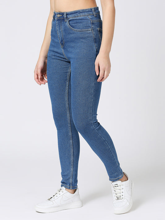 Pair of Cefalu high-waisted skinny jeans for women in a solid pattern, featuring a high rise, skinny fit, and multiple pockets. Made from a blend of cotton, polyester, and elastane