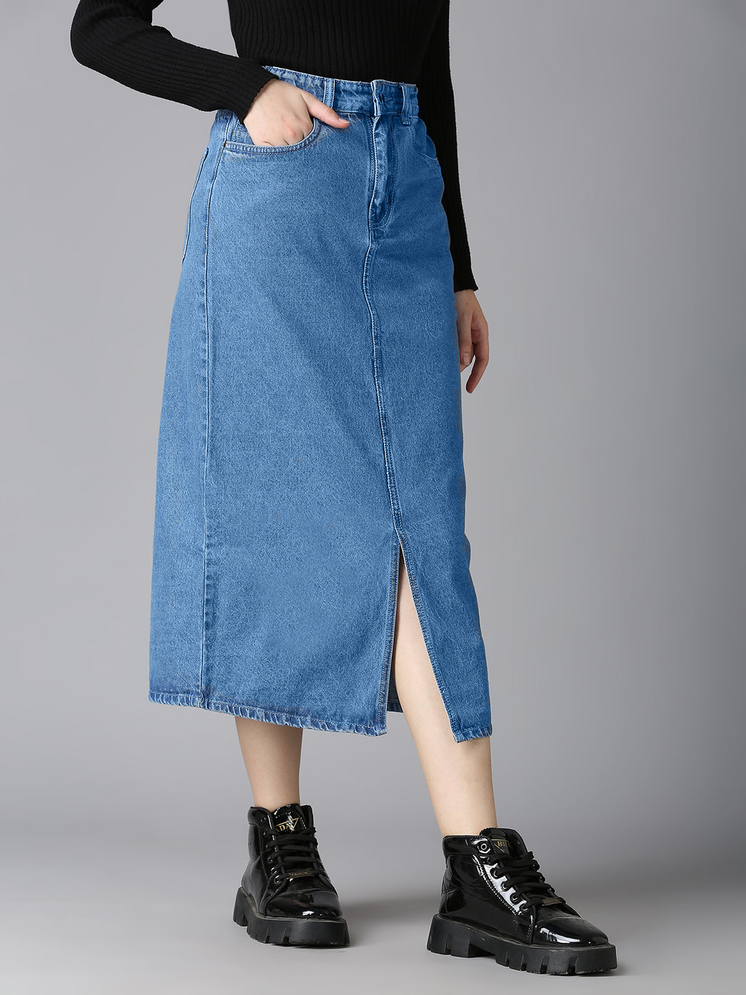 Angled view of Cefalu Women's Light Blue Denim Midi Skirt - Stylish High-Rise Fit with Slit for Comfortable Movement