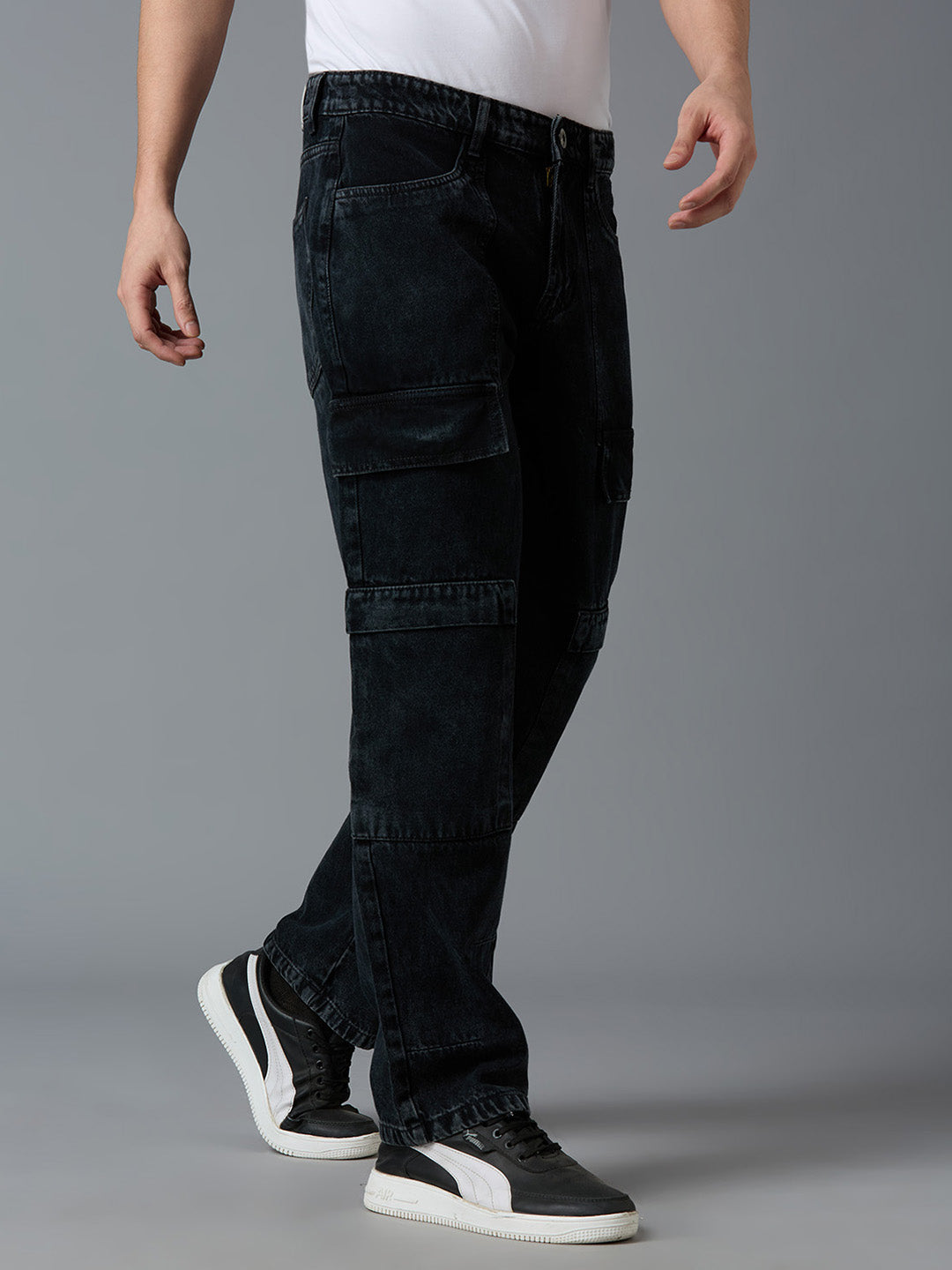 Angled view of TCI Men's Black Cargo Denim Pants - Stylish & Comfortable for Casual Wear