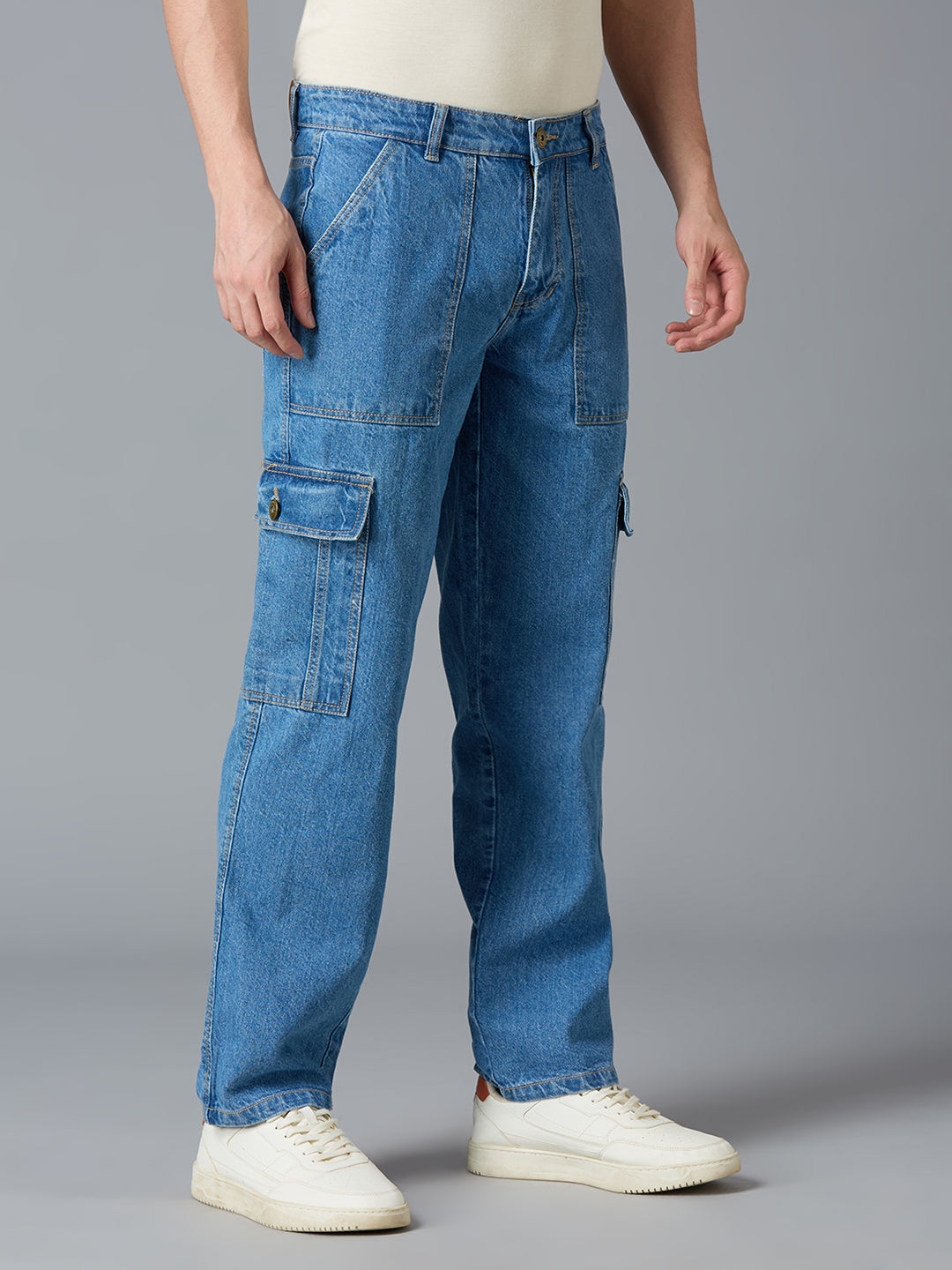 Angled view of TCI Men's Blue Cargo Denim Pants - Stylish & Comfortable for Casual Wear
