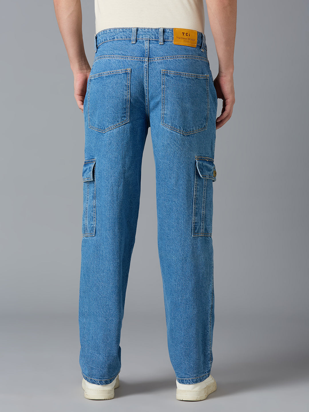 Back view of TCI Men's Blue Cargo Jeans - Elastic Waistband with Functional Pockets