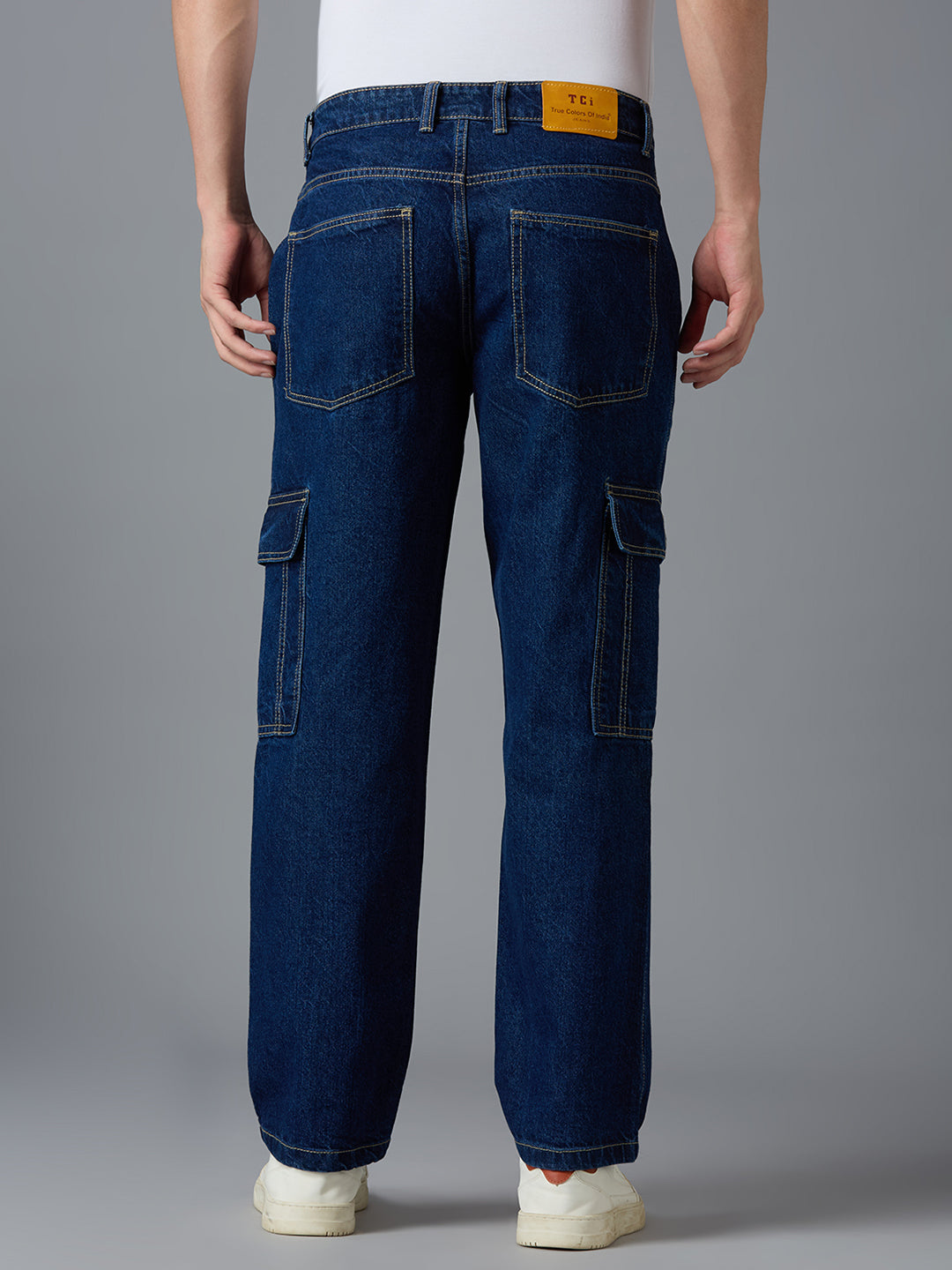 Back view of TCI Men's Dark Blue Cargo Jeans - Waistband with Functional Pockets