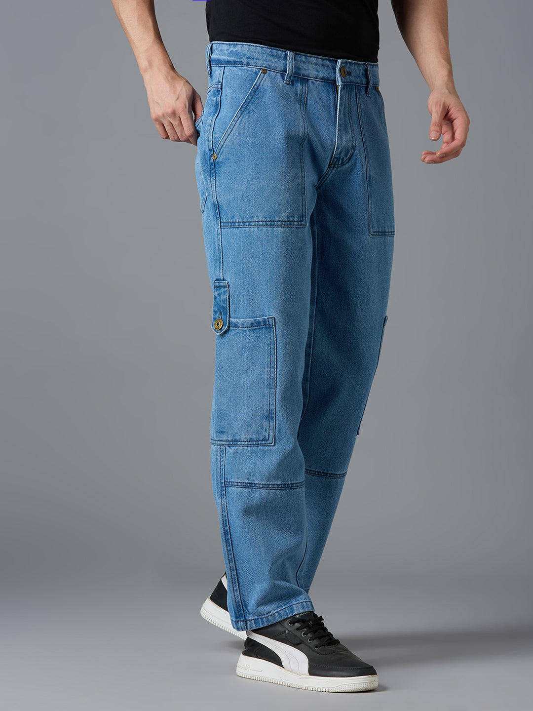 Angled view of TCI Men's Light Blue Cargo Denim Pants - Trendy & Comfortable
