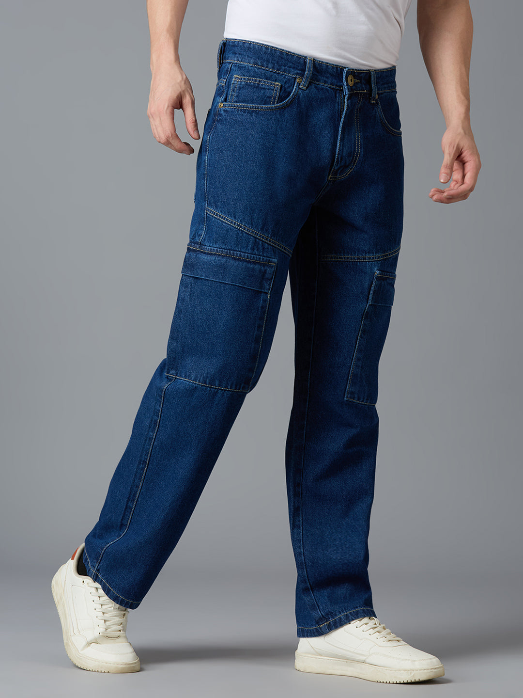 Angled view of TCI Men's Mid Blue Cargo Denim Pants - Stylish & Comfortable for Casual Wear