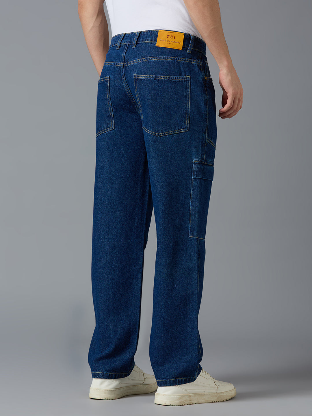 Back view of TCI Men's Blue Cargo Jeans - Classic Button Closure with Functional Pockets