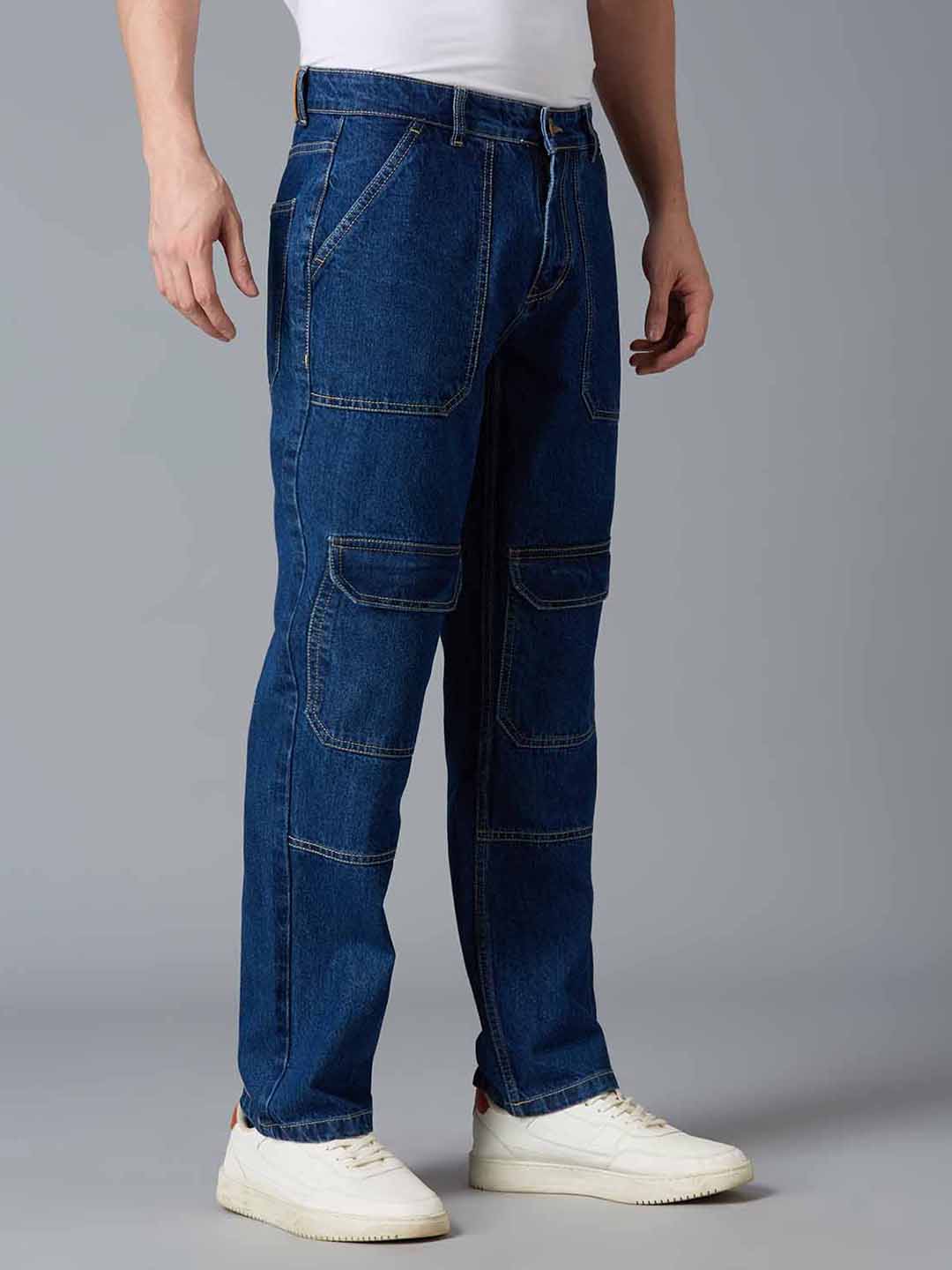 Angled view of TCI Men's Ink Blue Cargo Denim Pants - Stylish & Comfortable for Casual Wear