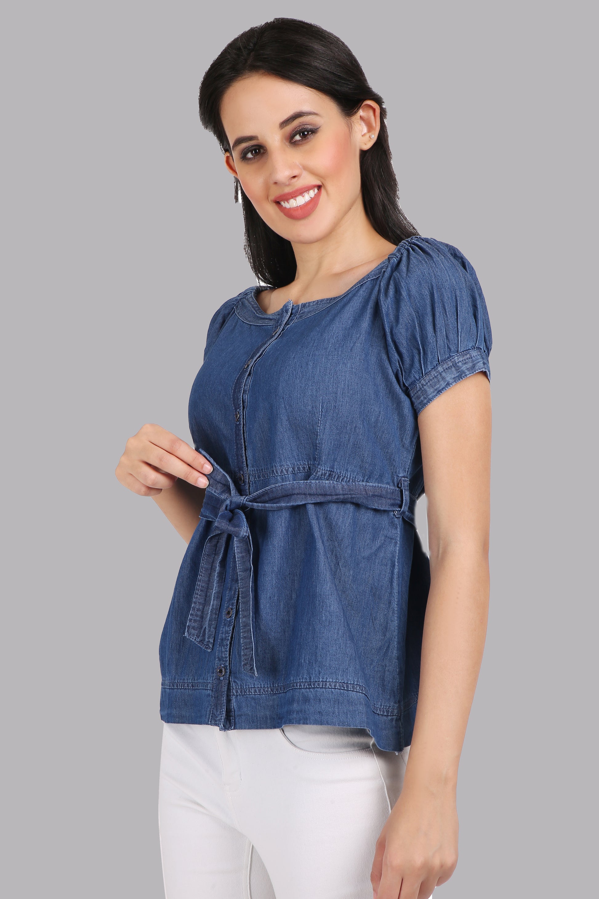 Side View of Cefalu Women's Blue Denim Top Showing Hip Length Fit and Puff Sleeves