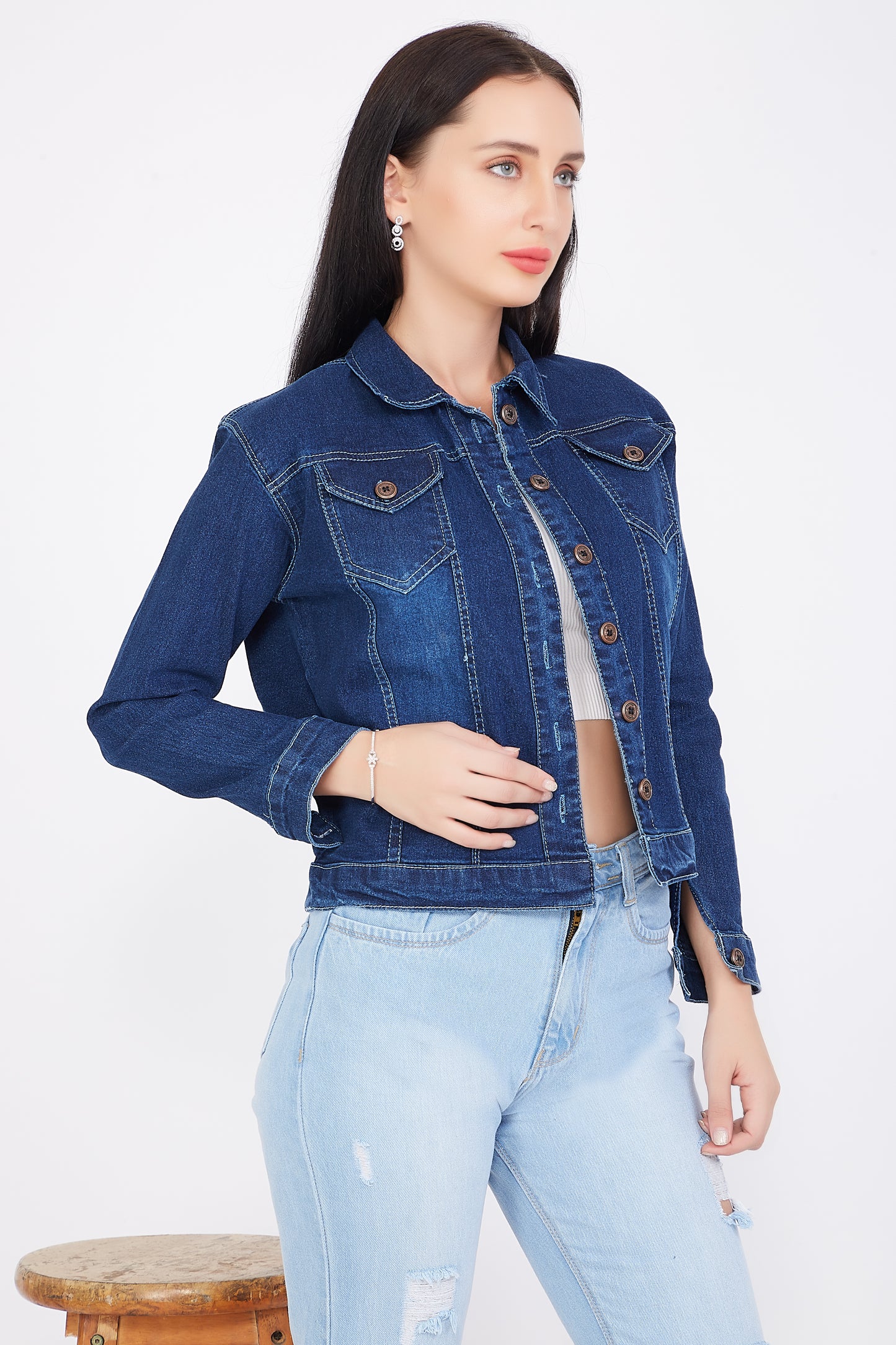 Side view of Cefalu®️ Women’s Blue Denim Jacket, showcasing the jacket’s full-length sleeves and stand collar.