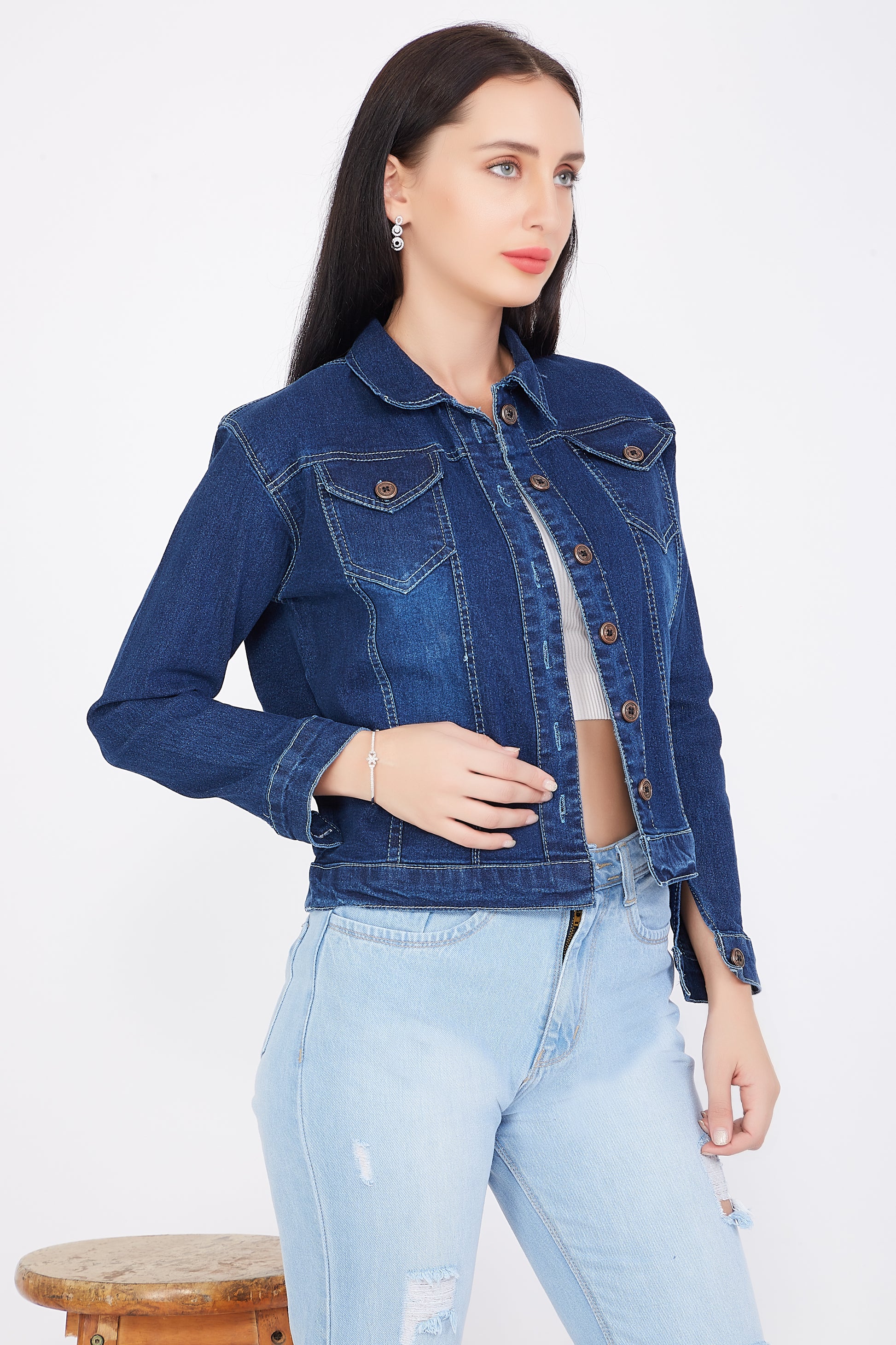 Side view of Cefalu®️ Women’s Blue Denim Jacket, showcasing the jacket’s full-length sleeves and stand collar.