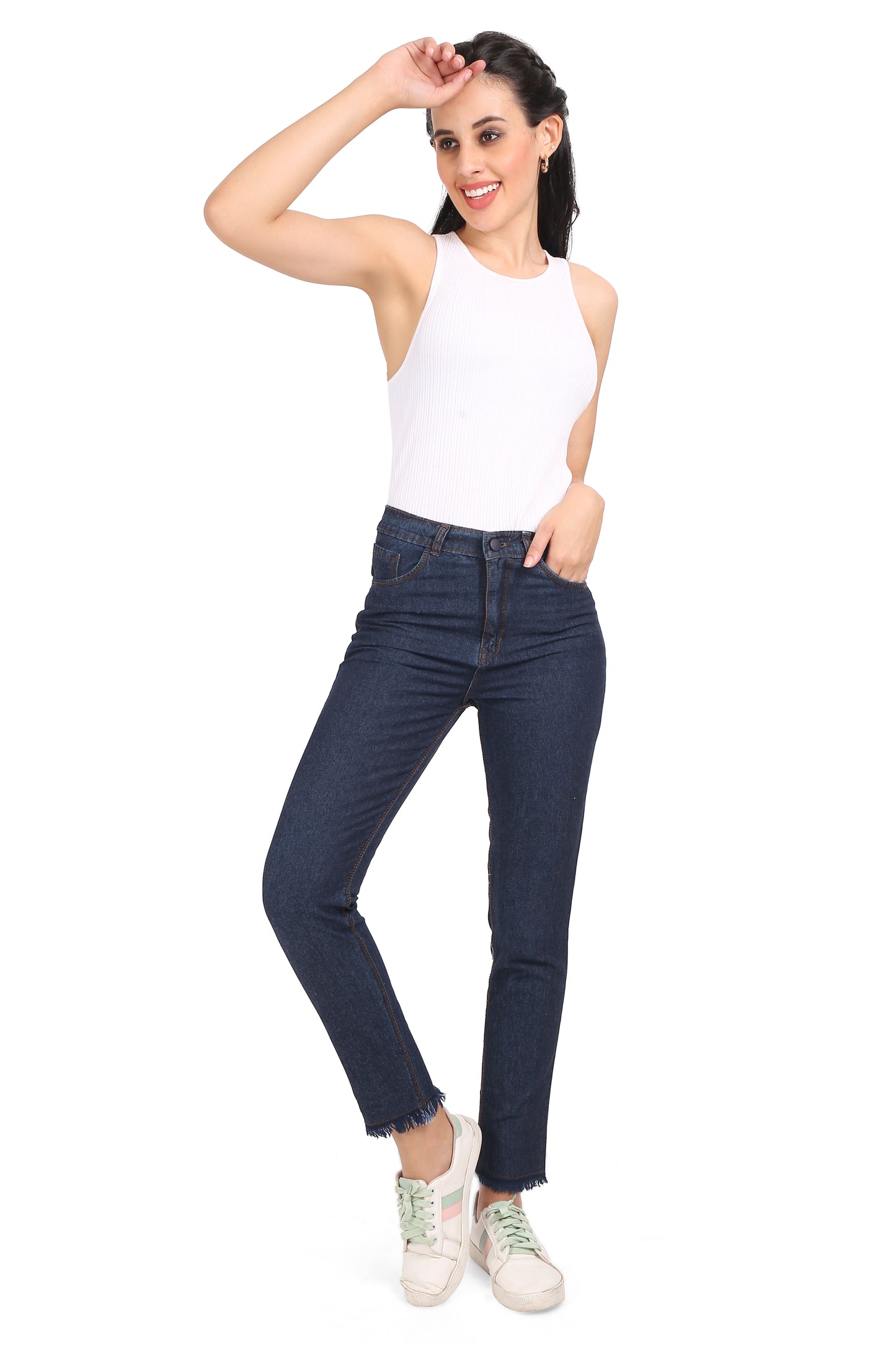 Full model view of Cefalu Women’s Dark Blue Mom Jeans, styled with a casual top and shoes. The model demonstrates the jeans’ versatile fit and trendy design, perfect for various occasions.