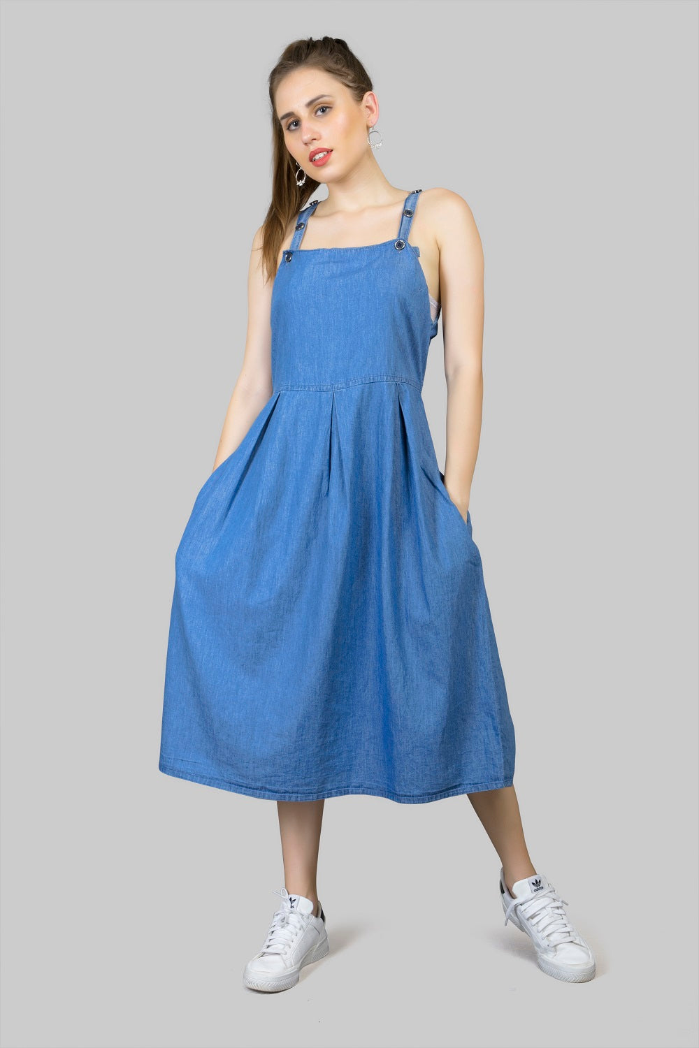 Detail View of Waistline Pleats and Functional Pockets on Cefalu Women's Blue Denim Midi Dress
