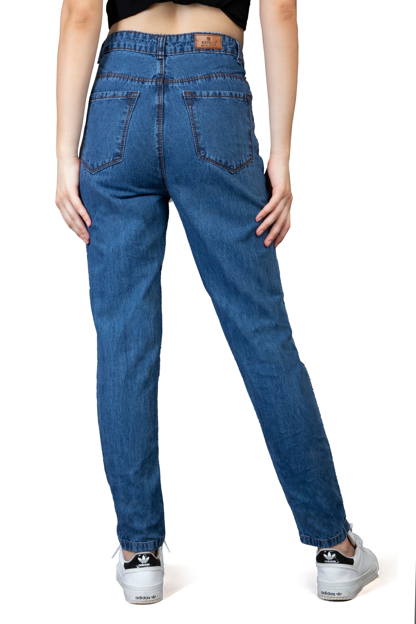 Back view of Cefalu Women’s Blue High-Waist Mom Jeans, showcasing the smooth, fitted back with stylish distressing and the classic five-pocket design.