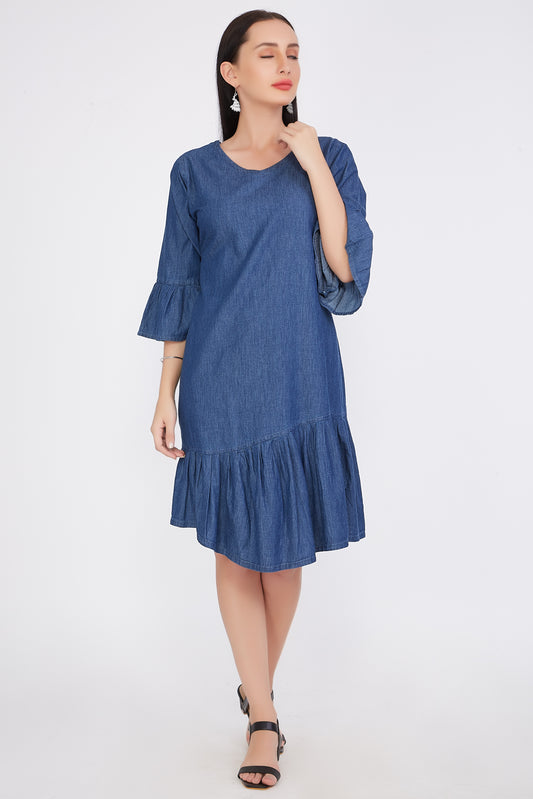 Front view of Cefalu®️ Women’s A-Line Blue Denim Dress featuring knee length, round neck, and bell sleeves.
