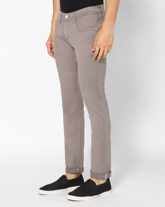 Side view of TCI Men’s Aish Grey Cotton Jeans, showcasing the slim, regular fit and stylish ash grey color.