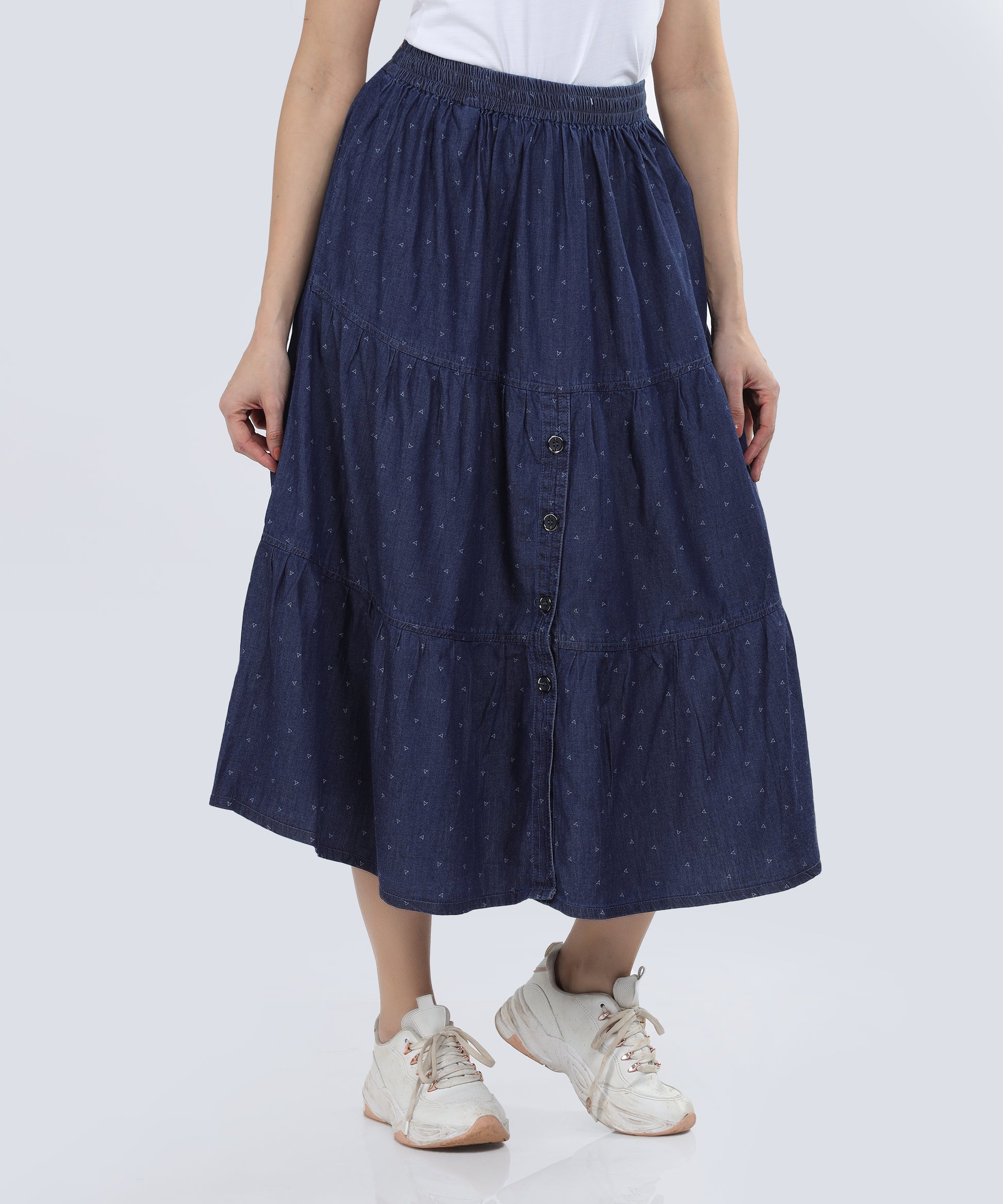 Detail shot of the buttons of the Cefalu Women’s Denim Skirt, highlighting fashions.