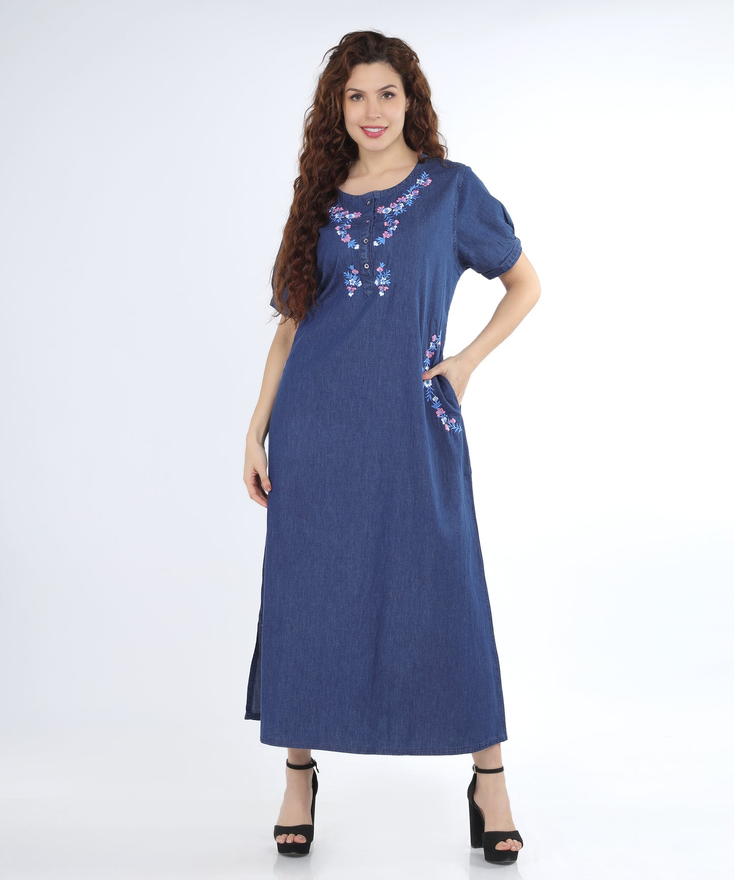 Model showcasing the Cefalu Women’s Denim Gown in blue, styled for a cozy evening at home.
