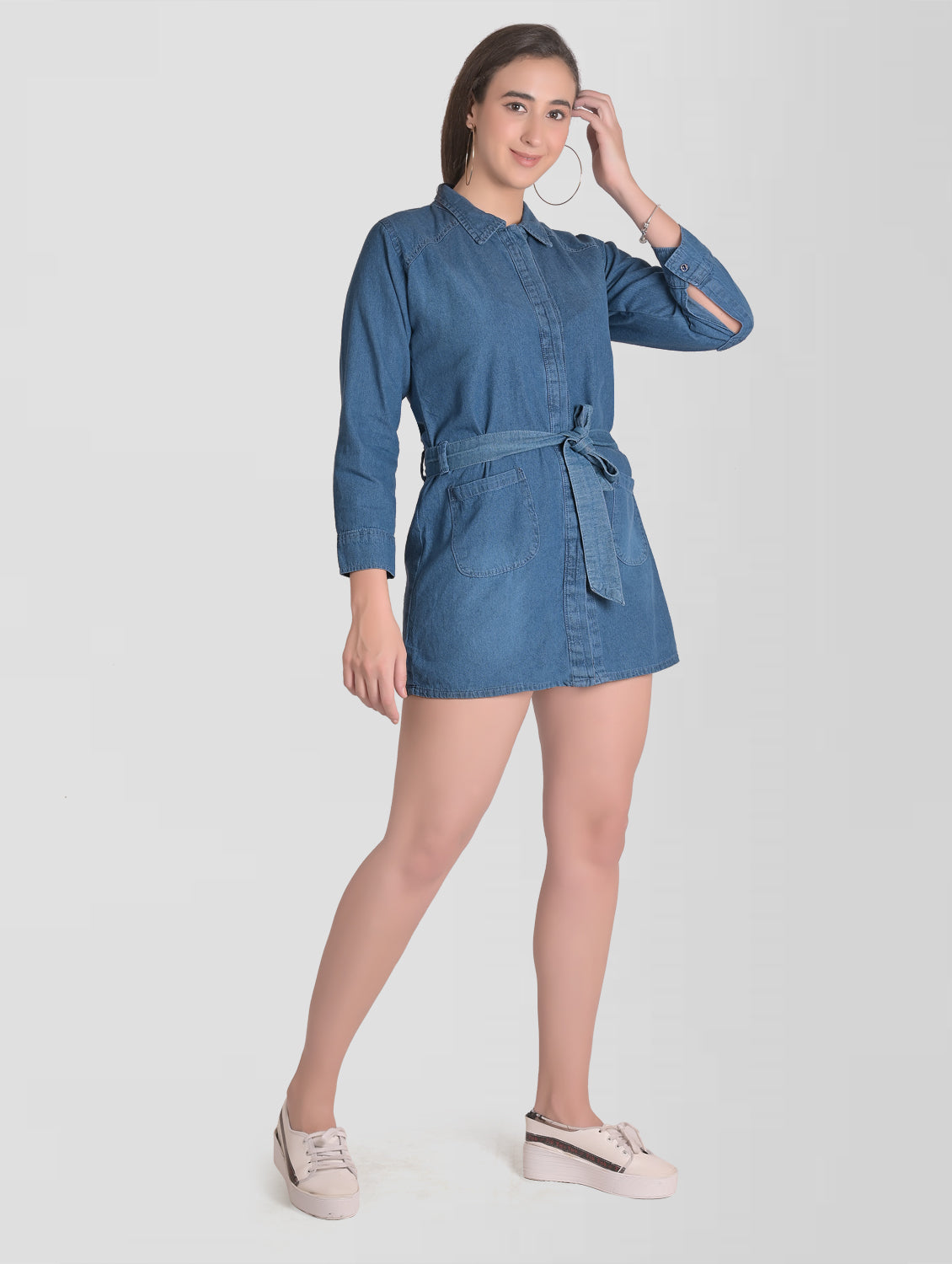 Women’s Blue Denim Shirt Dress styled with heels and accessories, showcasing its versatility for casual or semi-formal events.