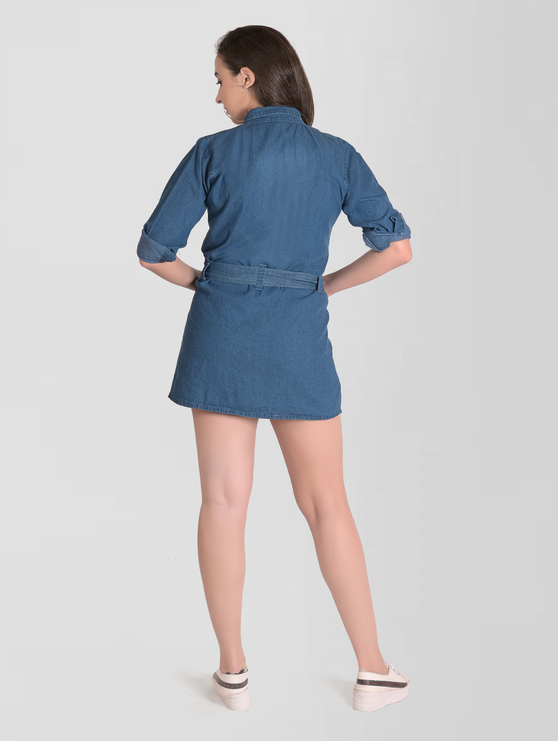 Back view of Women’s Blue Denim Shirt Dress showing the full sleeves and belt detail.