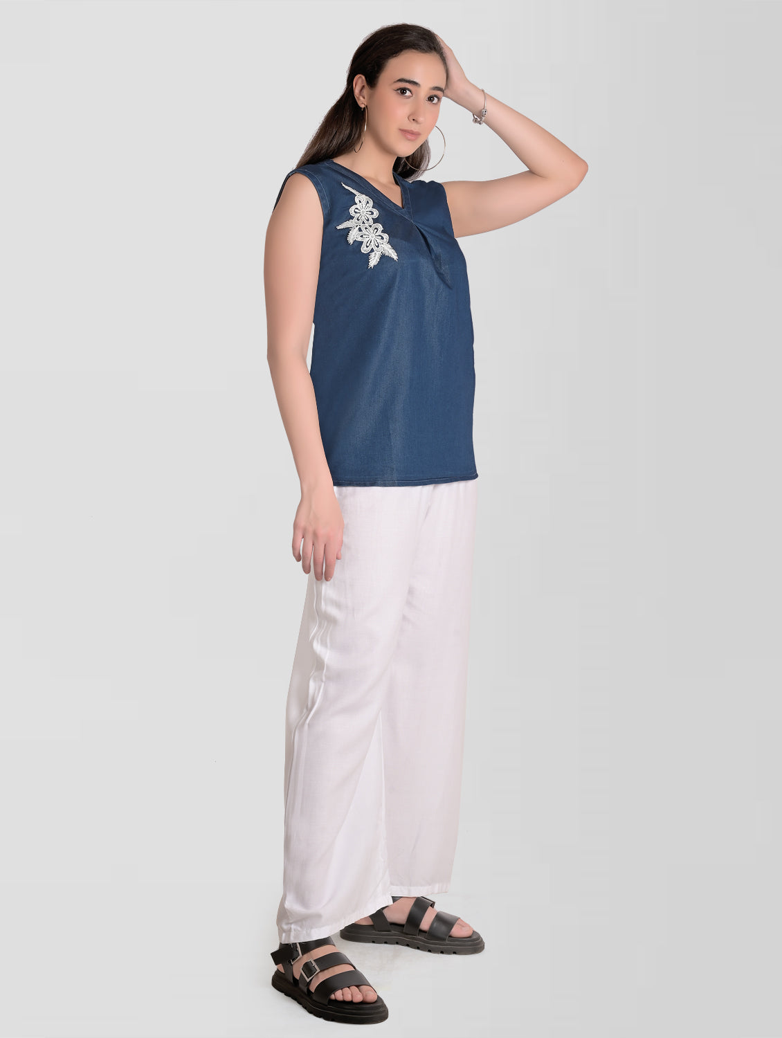 Detailed view of the front patchwork design on Cefalu Women’s Blue Denim Top.