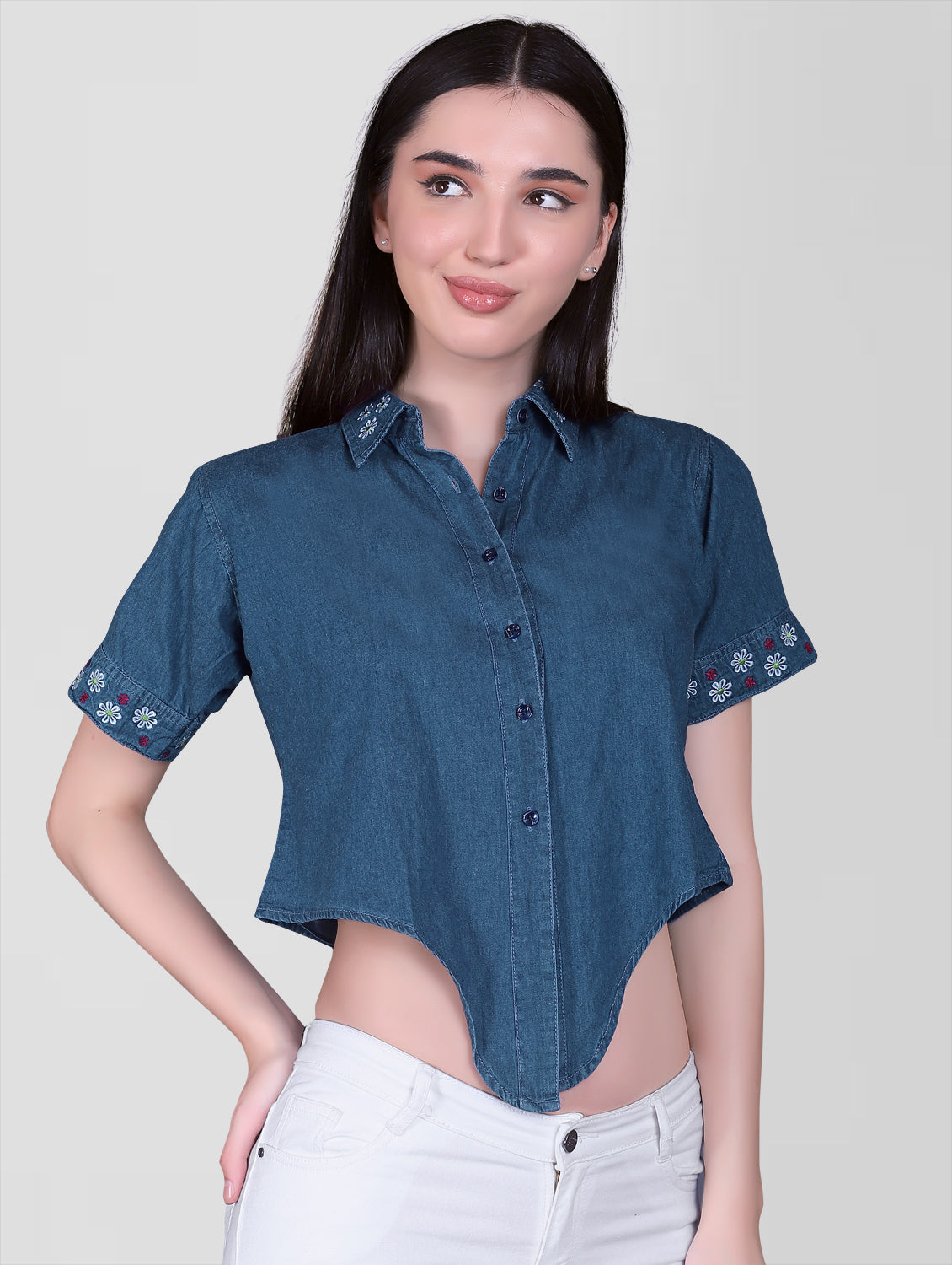 Side view of Women’s Blue Denim Embroidered Shirt Top demonstrating the half sleeve cut and crop top fit.