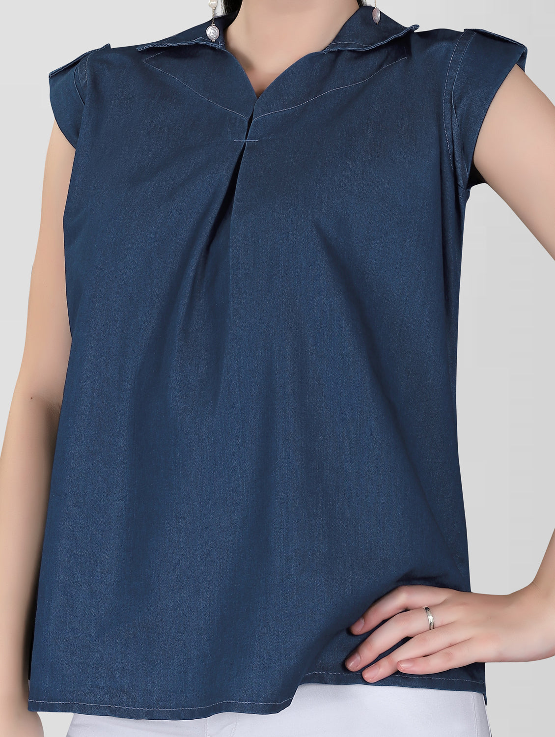 Close-up of V-neck and luppi buttons on Cap Sleeves Women’s Dark Blue Casual Top.