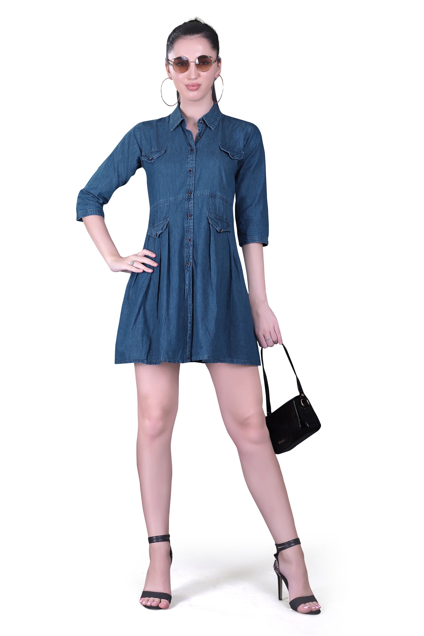 Full model view of Cefalu Women’s Blue Denim Dress, demonstrating the stylish fit & flare cut, shirt collar, and 3/4 sleeves in a complete outfit.