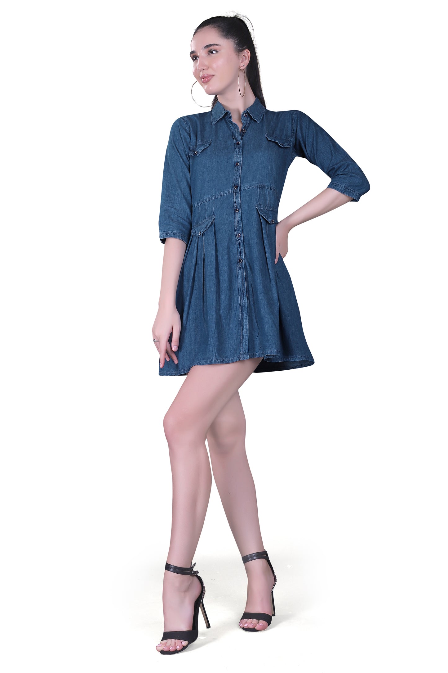 Left side view of Cefalu Women’s Blue Denim Dress, emphasizing the 3/4 sleeves and the dress's fit & flare silhouette.