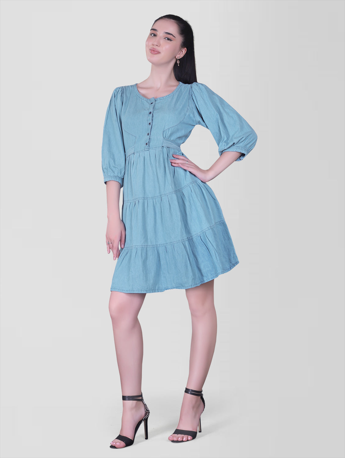 Close-up of front buttons on Cefalu Women’s Light Blue Denim Dress highlighting detailed button closure.