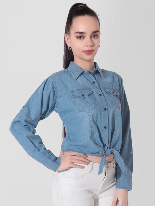 Close-up of Cefalu Blue Denim Top’s knotted front detail and fabric texture