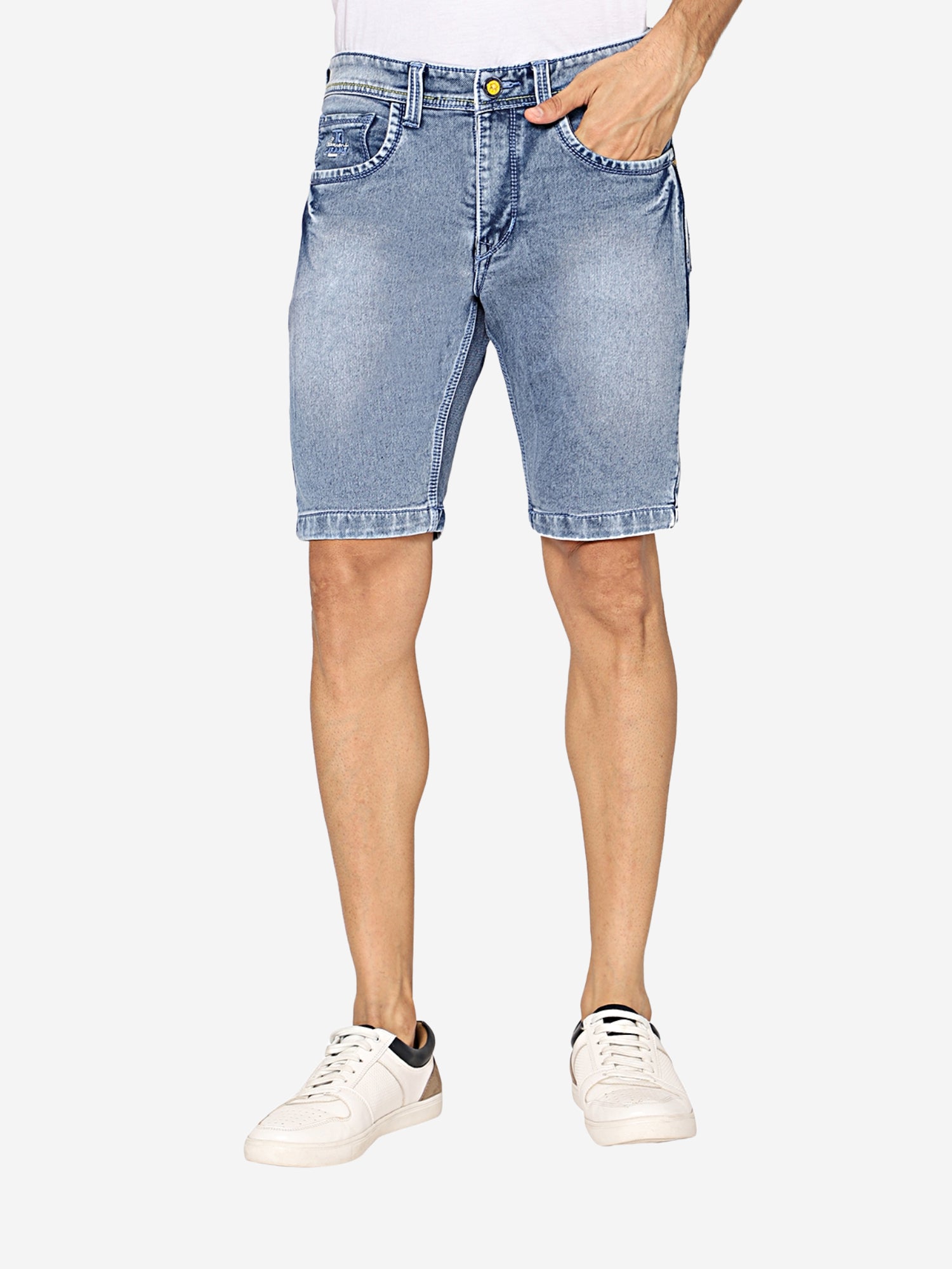 Model wearing TCI Men’s Light Blue Denim Shorts, showcasing the slim fit and mid-rise design.