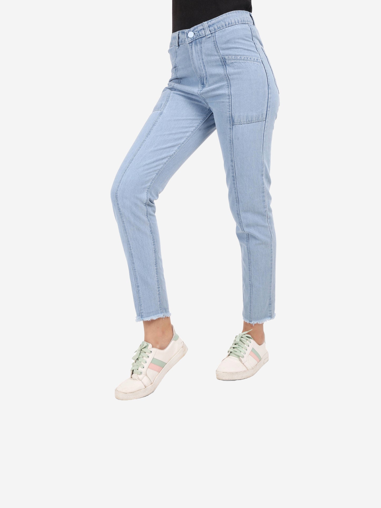 Cefalu Women's Light Blue Mid-Rise Mom Jeans - Side view showing relaxed fit and contemporary raw edge detail.