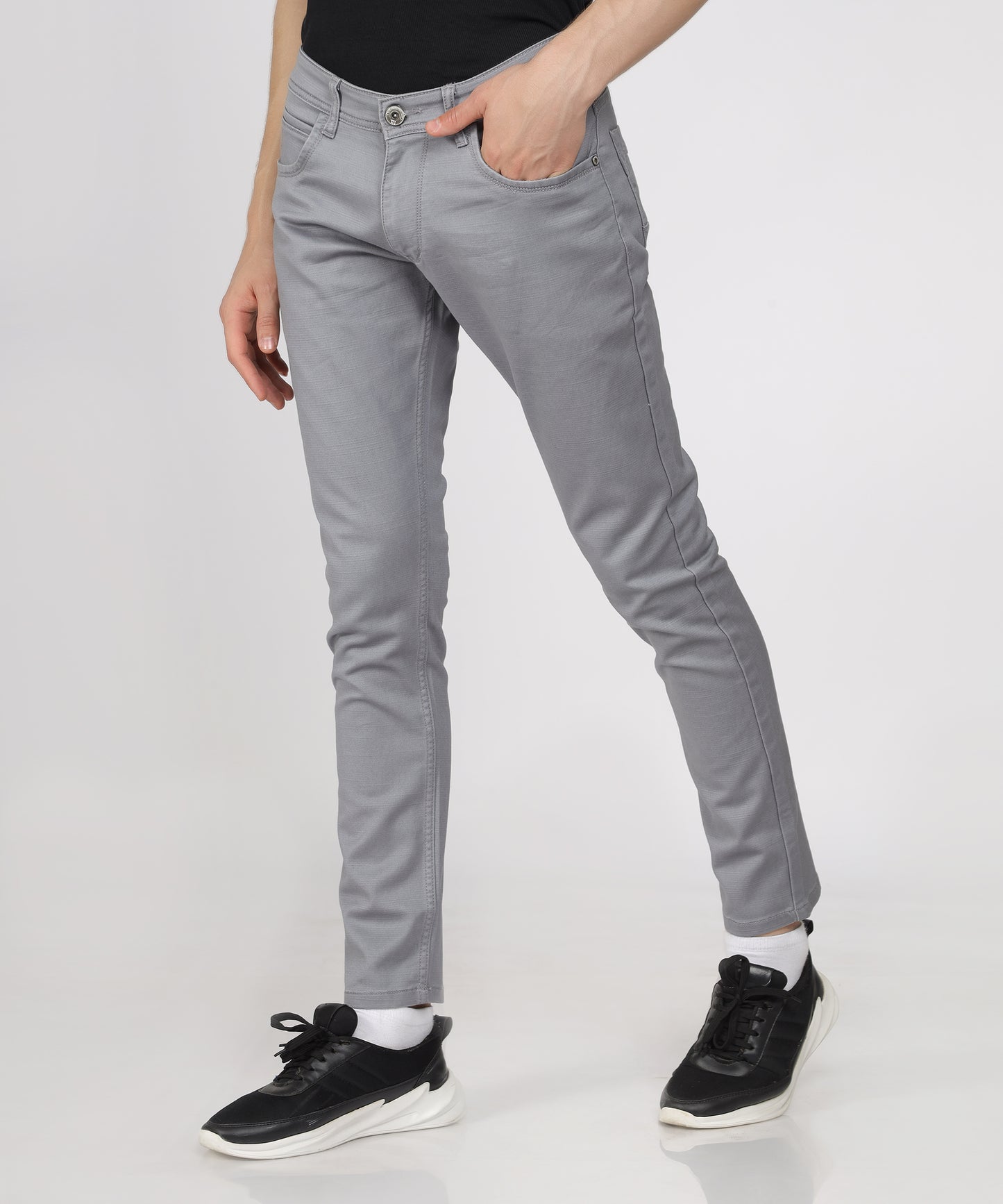 Detail of the button closure on TCI Men’s Light Grey Trousers.