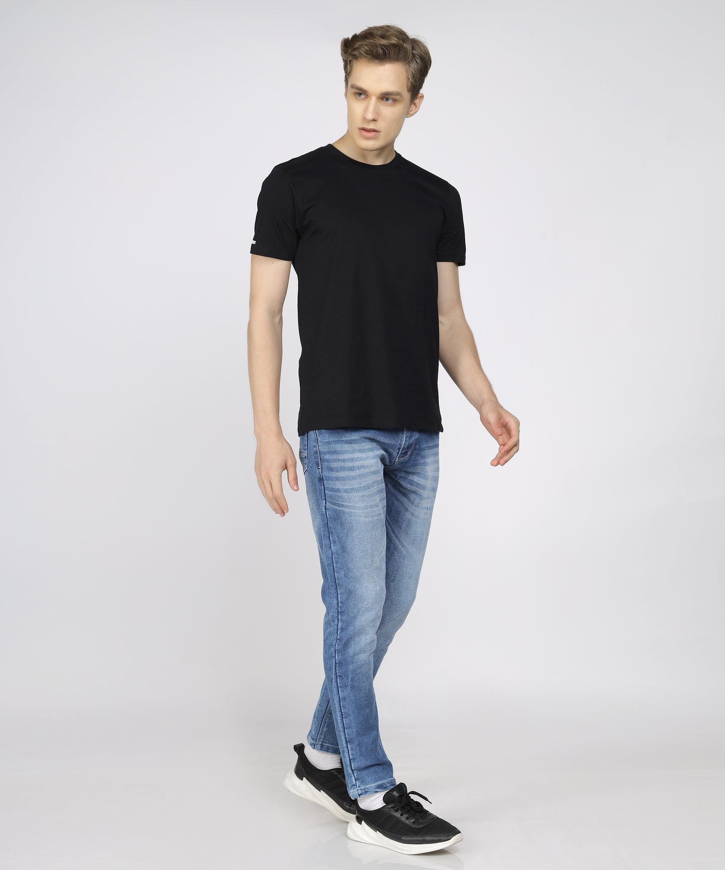 Model view of True Colors of India®️ (TCI) Men's Mid Blue Slim Fit Stretchable Cotton knits Jeans with Whisker Details