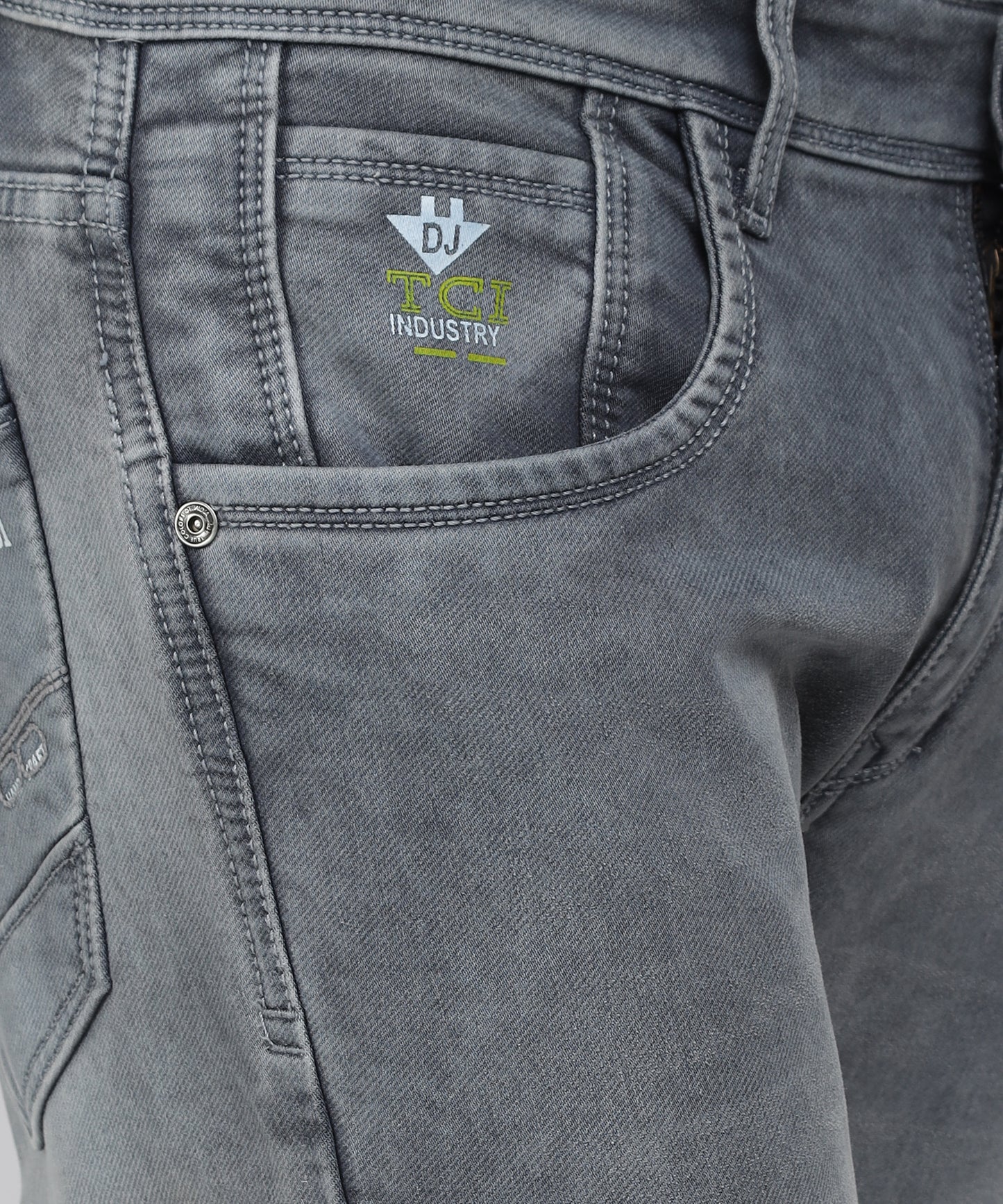 Close-up of the high-quality stretchable denim fabric of TCI Men’s Jeans.