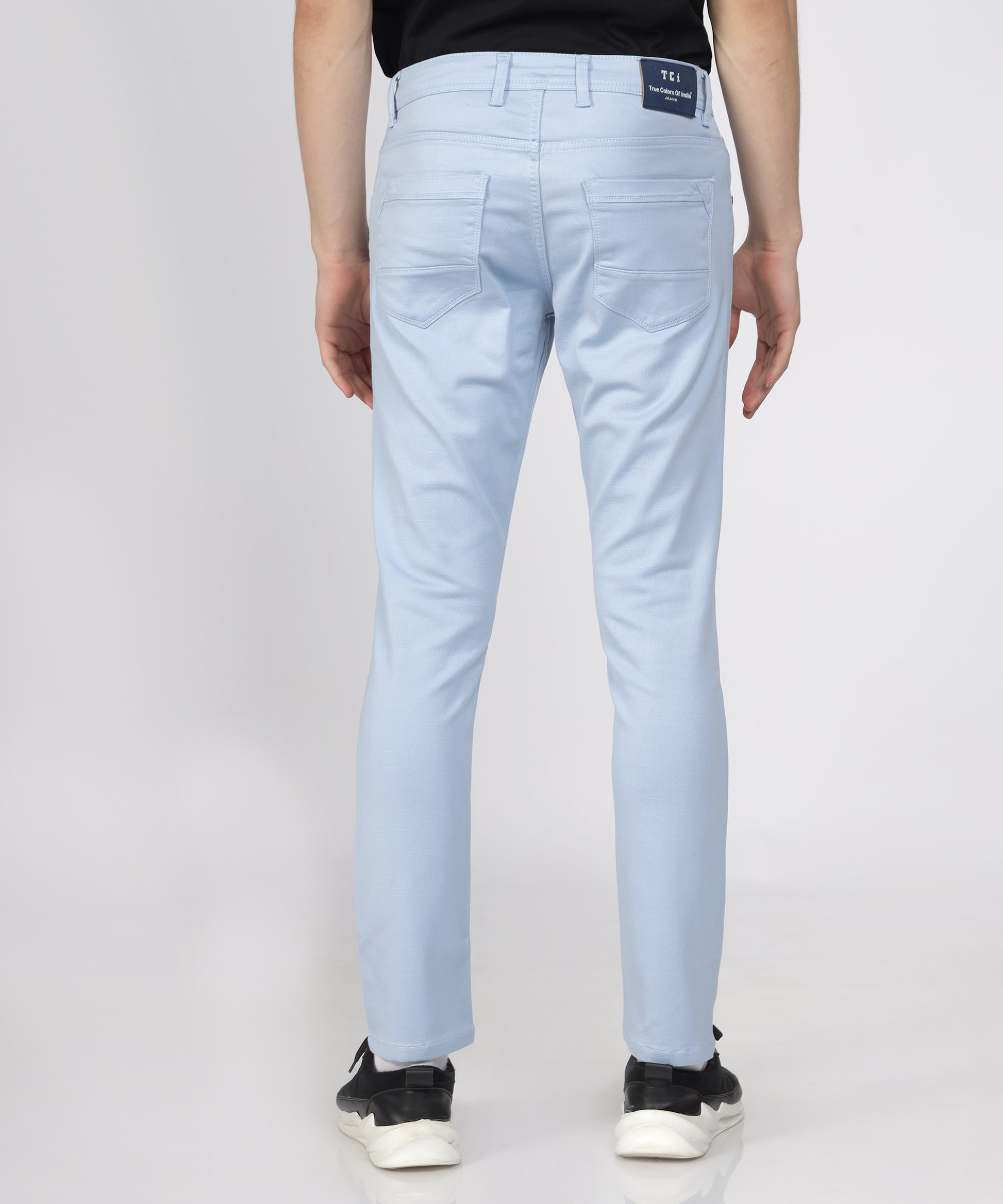 Back View of TCI Men’s Light Blue Regular Fit Trousers displayed.