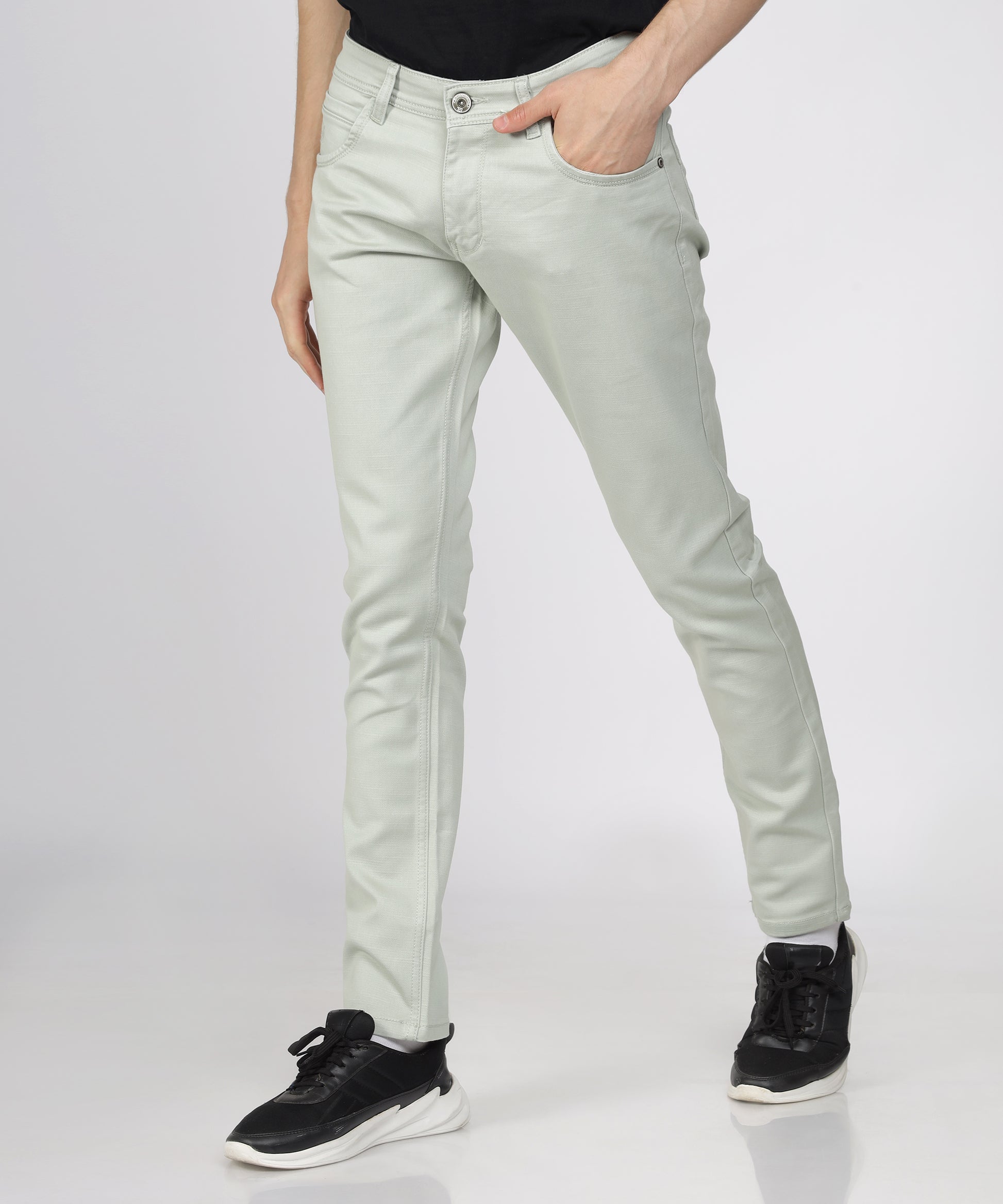 Detail of the button closure on TCI Men’s Steel Grey Trousers.