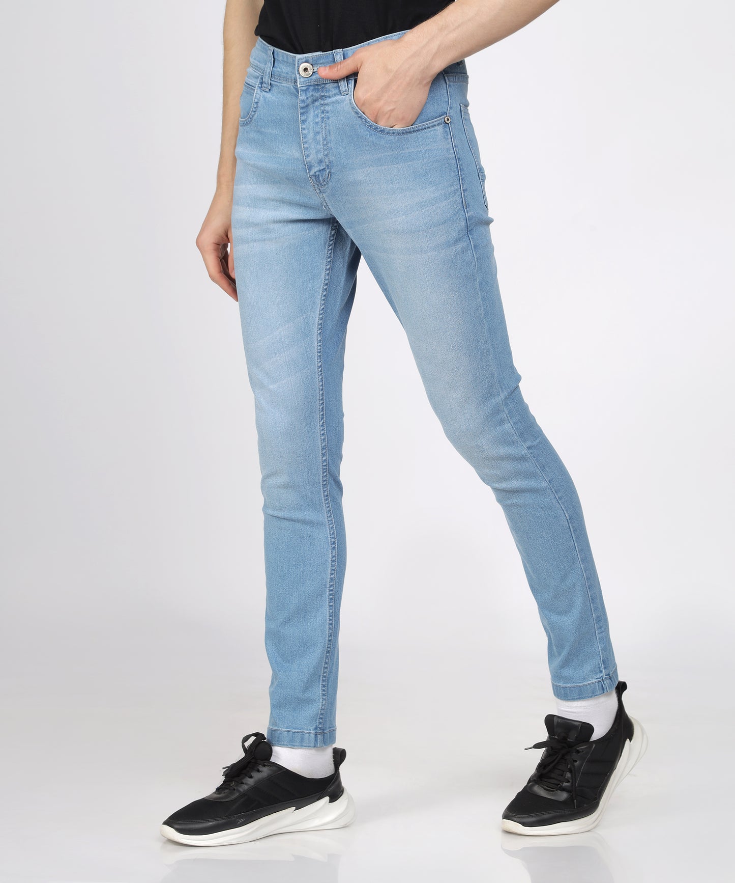 Fabric texture of TCI Men’s Light Blue Slim Fit Jeans highlighting stretchability.