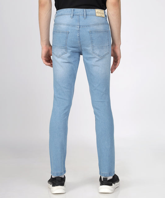 Back view of Fabric texture of TCI Men’s Light Blue Slim Fit Jeans highlighting stretchability.