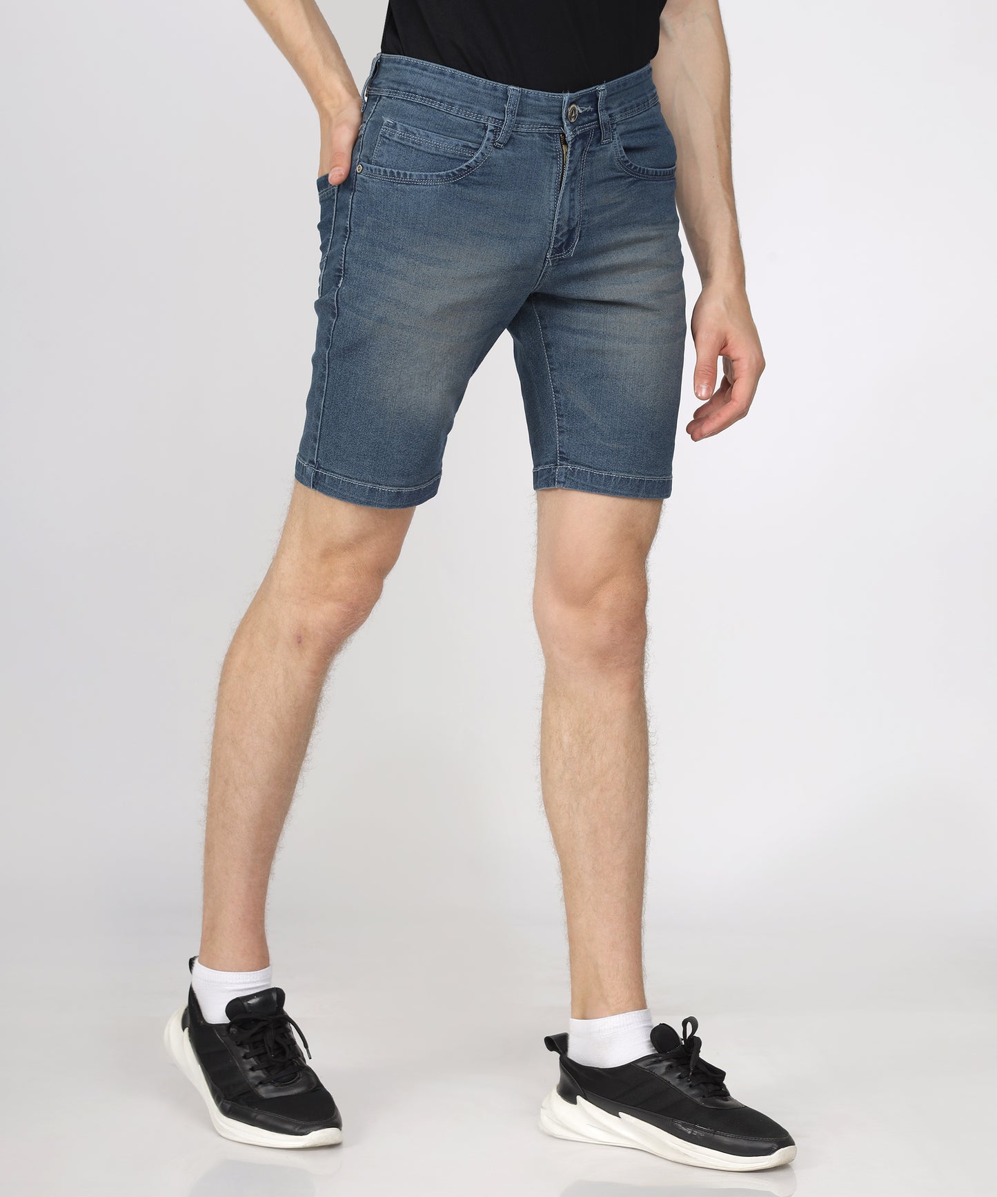 Knee length design of TCI Men’s Corbon Blue Denim Shorts.