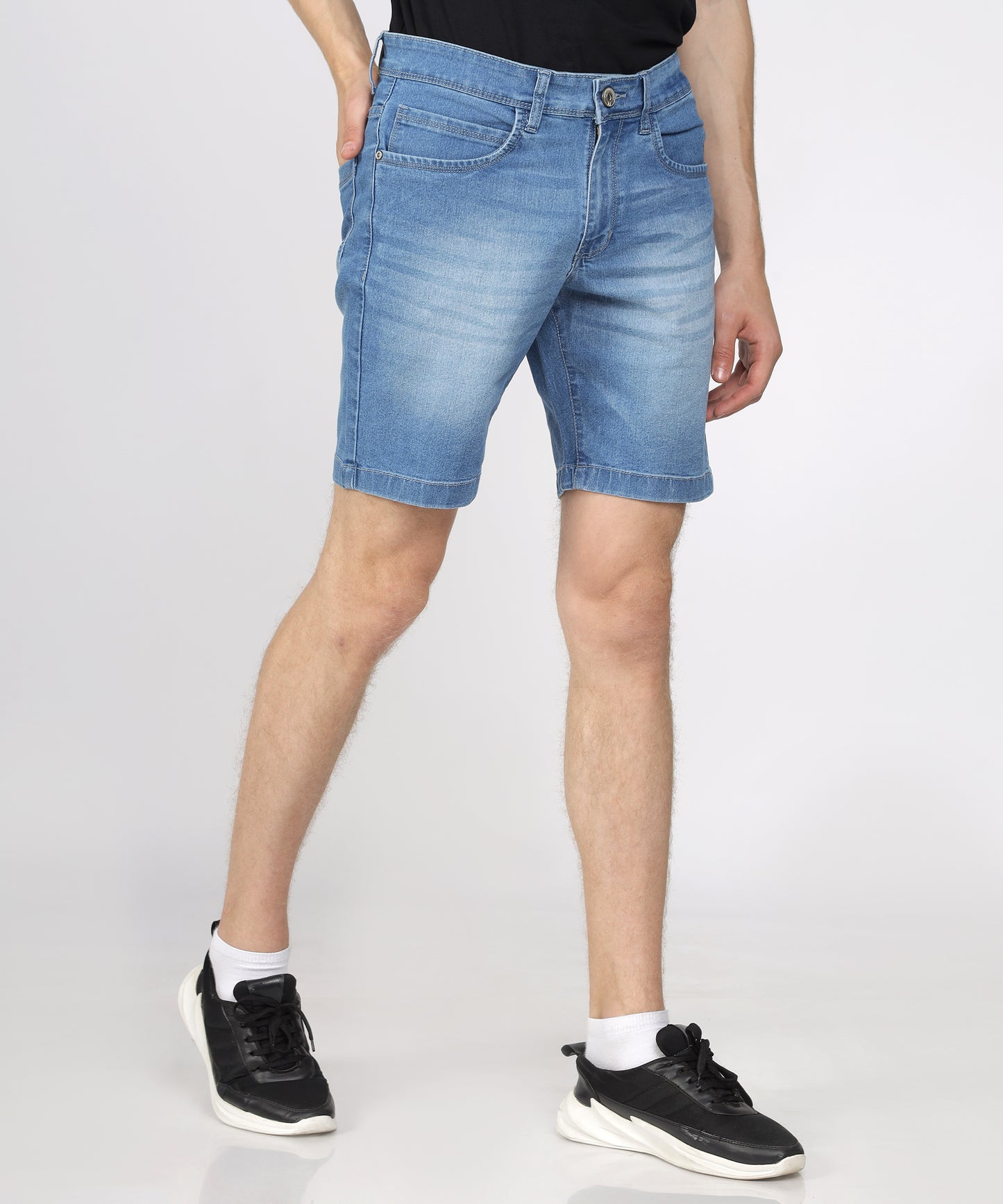 Knee length design of TCI Men’s Light Blue Denim Shorts.