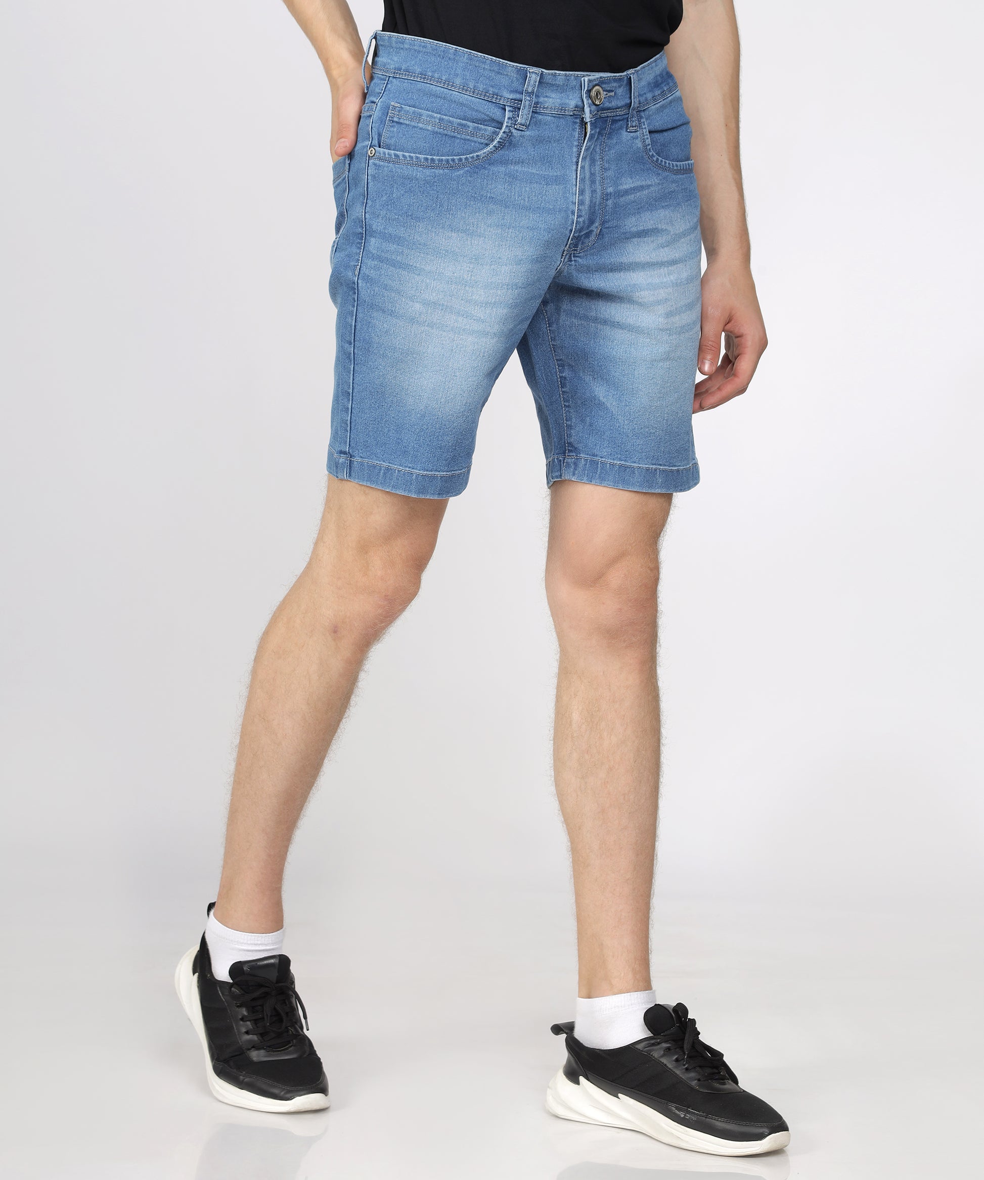 Knee length design of TCI Men’s Light Blue Denim Shorts.