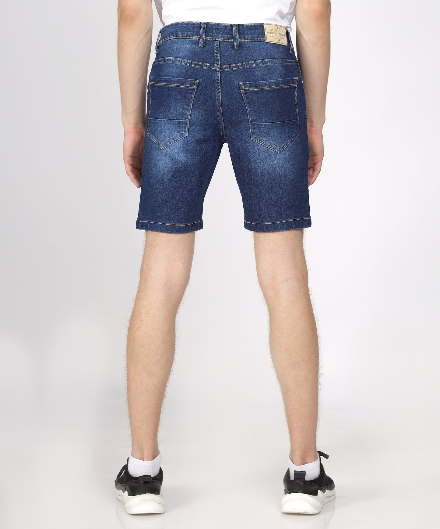 back view of TCI Men’s Mid Blue Regular Fit Denim Shorts displayed.