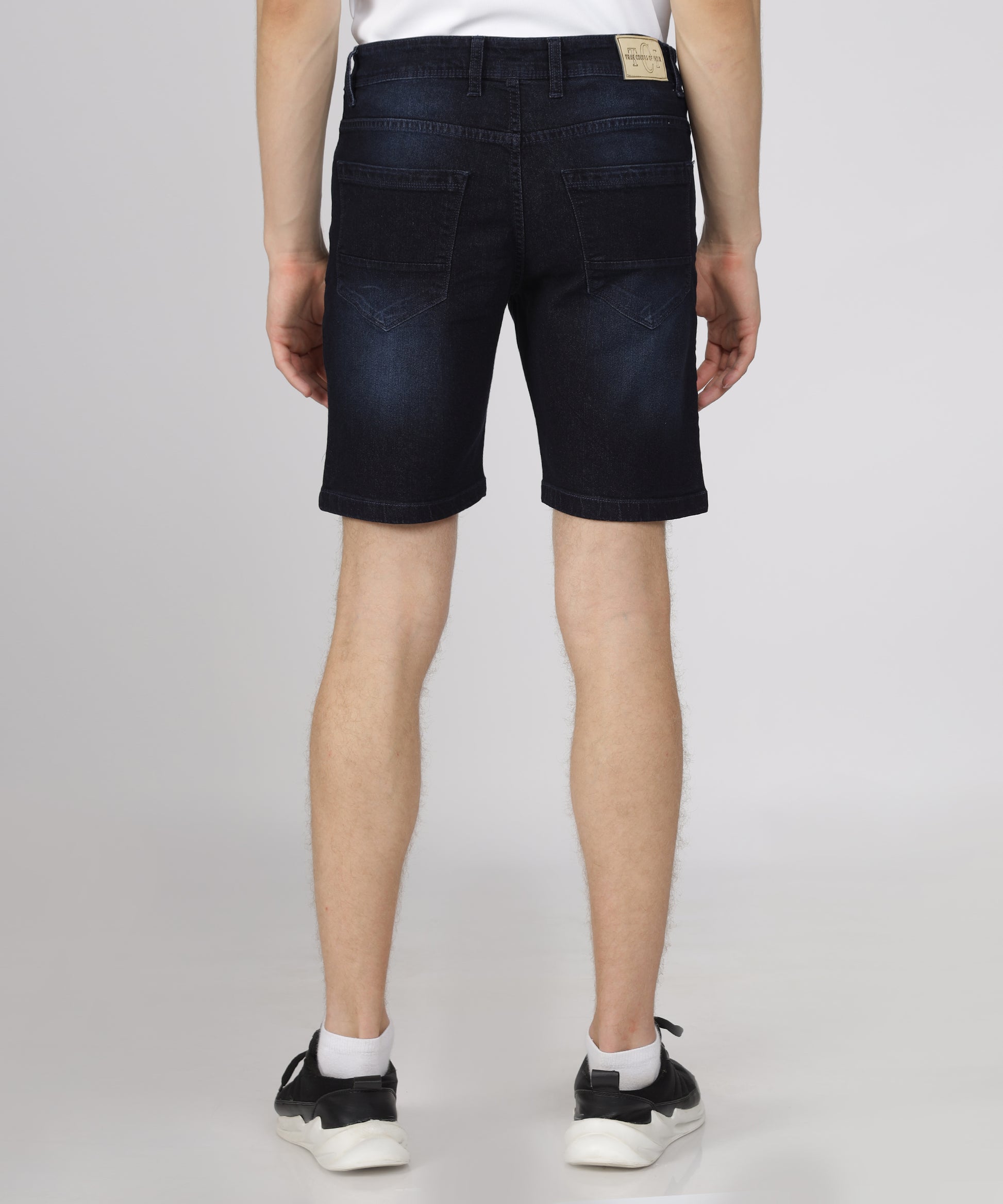 Back view of TCI Men’s Nevy Blue Regular Fit Denim Shorts displayed.