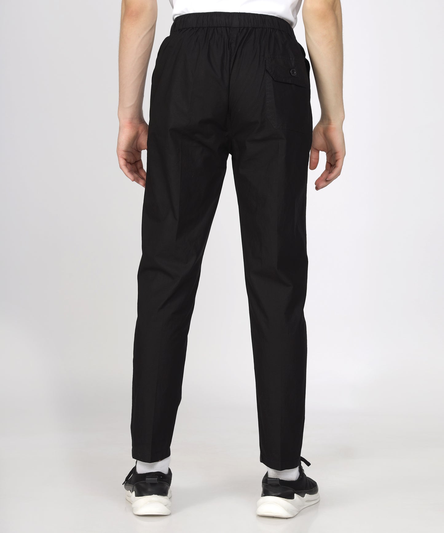 Back view of TCI Men’s Black Comfort Fit Cotton Trouser displayed.