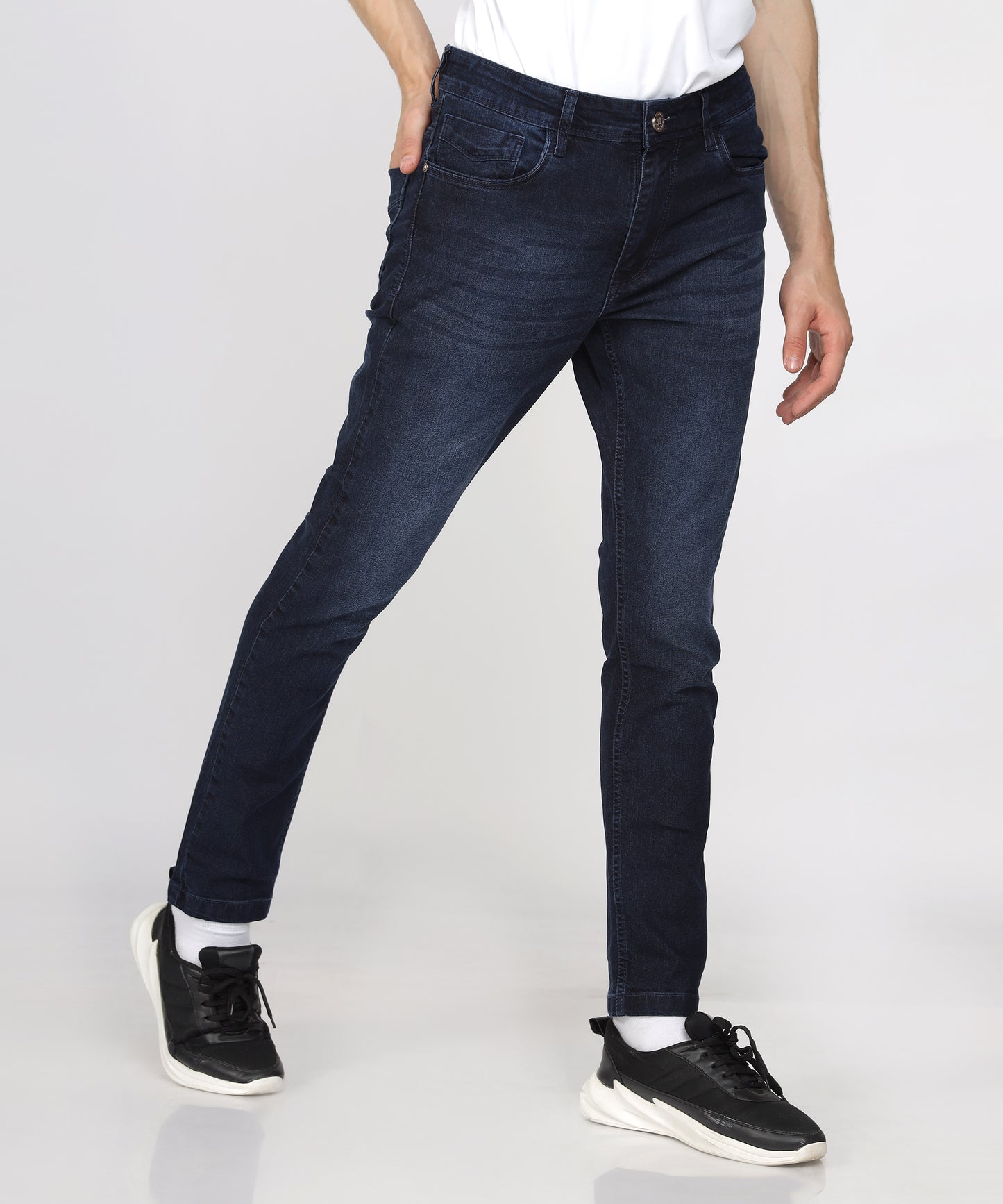 Texture of TCI Men’s Ink Blue Slim Fit Jeans highlighting stretchability.
