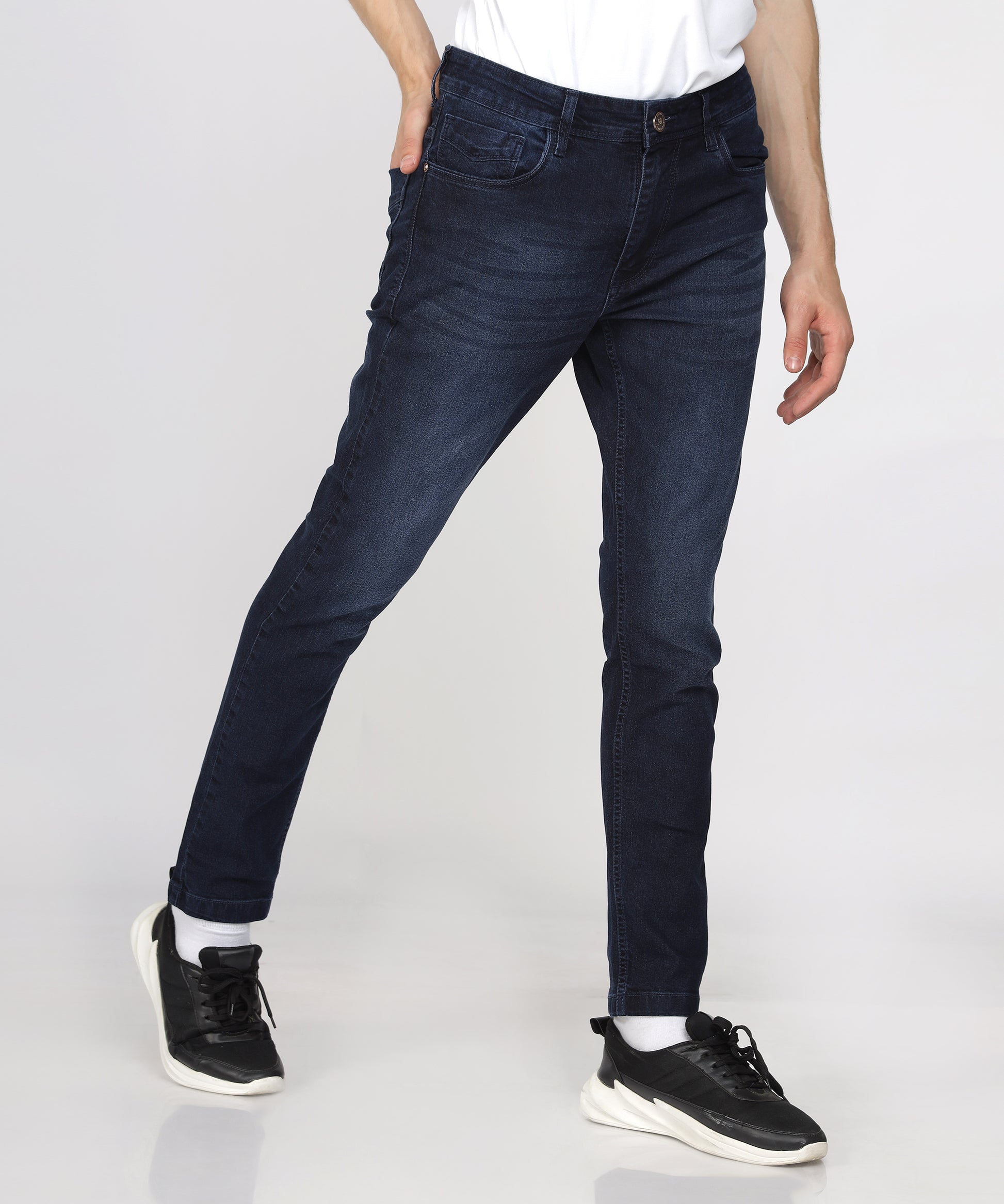 Texture of TCI Men’s Ink Blue Slim Fit Jeans highlighting stretchability.