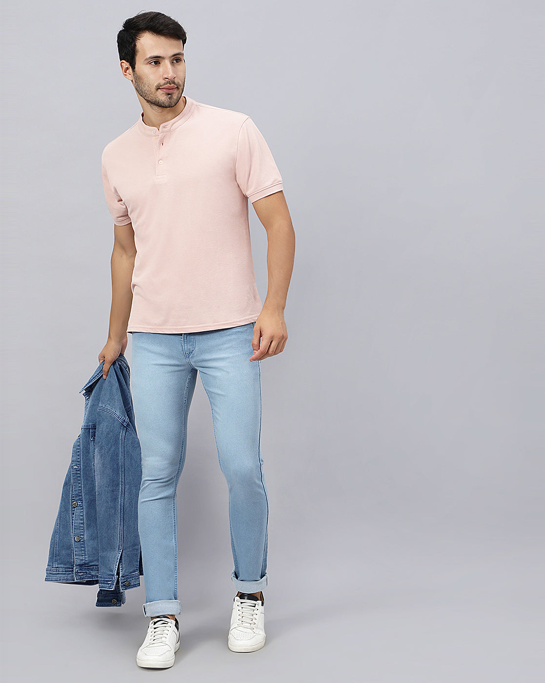 Model wearing True Colors of India®️ light blue jeans for men, demonstrating the stylish fit and comfort.