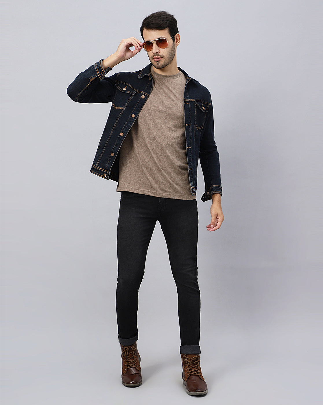 Model wearing TCI Men's Stylish Black Denim Jeans, demonstrating the fit and versatility of the jeans.