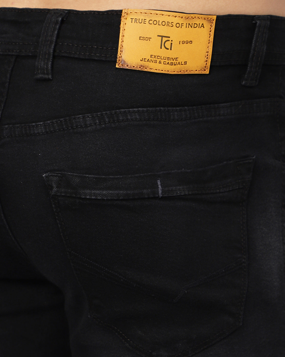 Close-up of the back pocket on TCI Men's Stylish Black Denim Jeans, emphasizing the quality stitching and design.