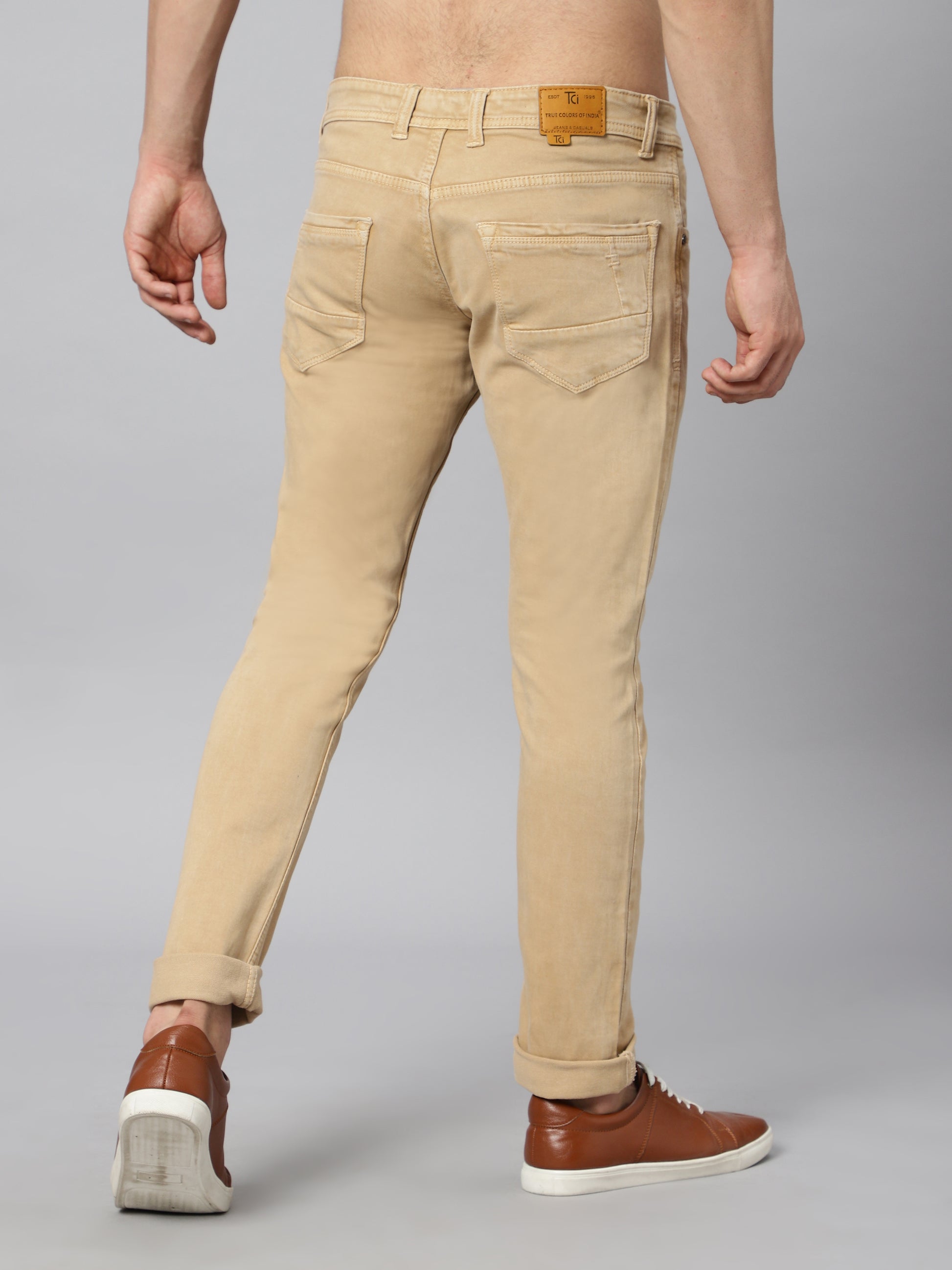 TCI Men’s Beige (Fawn) Jeans – Back view highlighting the comfortable pockets and overall fit.